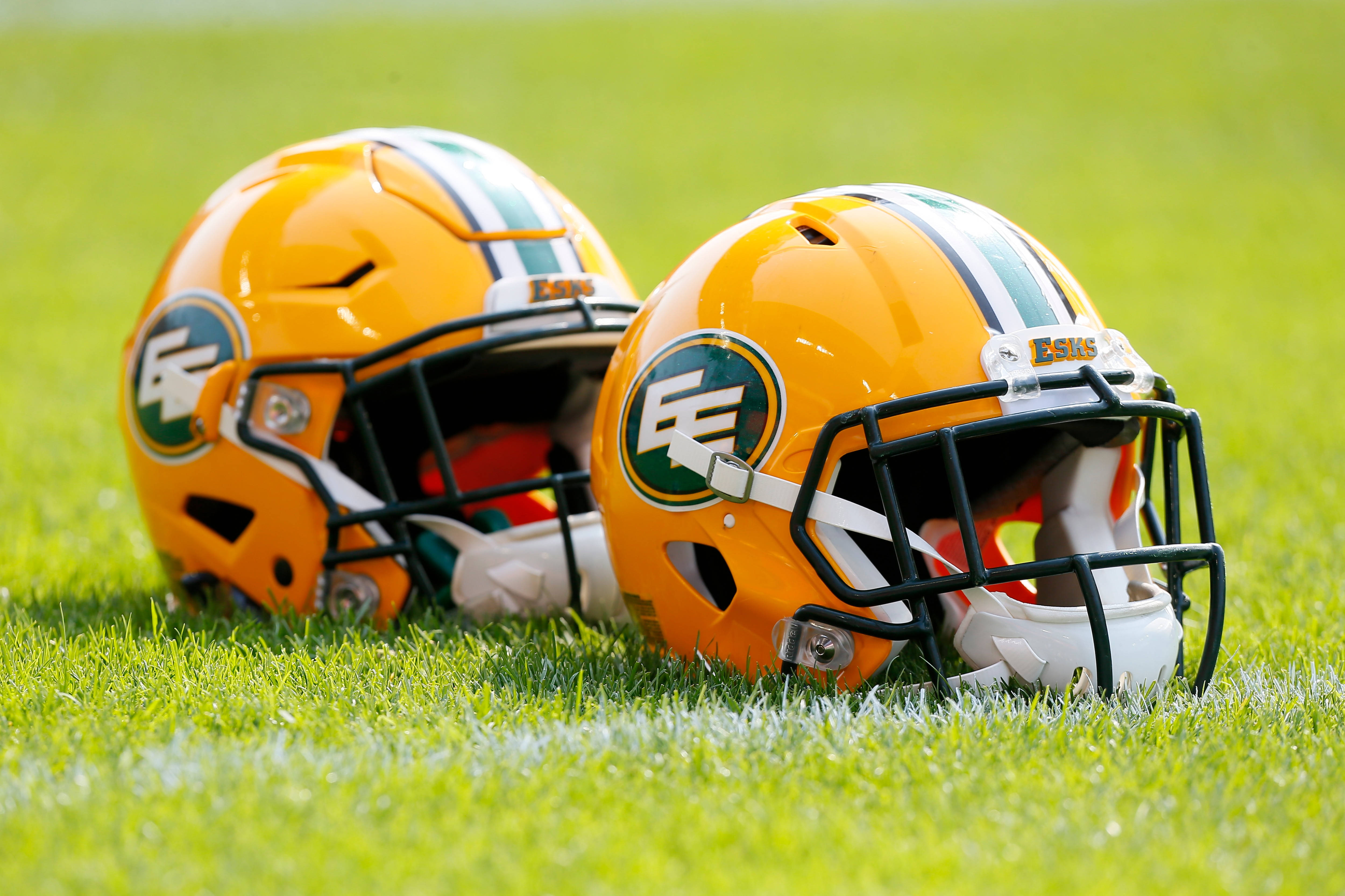 TORONTO, ON - SEPTEMBER 16: Edmonton Eskimos helmets lined up during the warm up against the Toronto Argonauts at BMO field on September 16, 2017 in Toronto, Ontario, Canada. Toronto defeated Edmonton 36-24. (Photo by John E. Sokolowski/Getty Images)