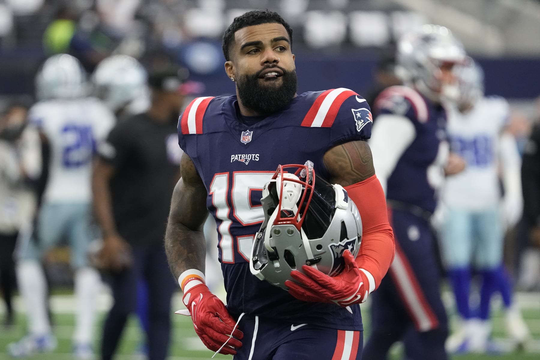 ARLINGTON, TEXAS - OCTOBER 01: Ezekiel Elliott #15 of the New England Patriots walks on the field before the game against the Dallas Cowboys at AT&T Stadium on October 01, 2023 in Arlington, Texas. (Photo by Sam Hodde/Getty Images)