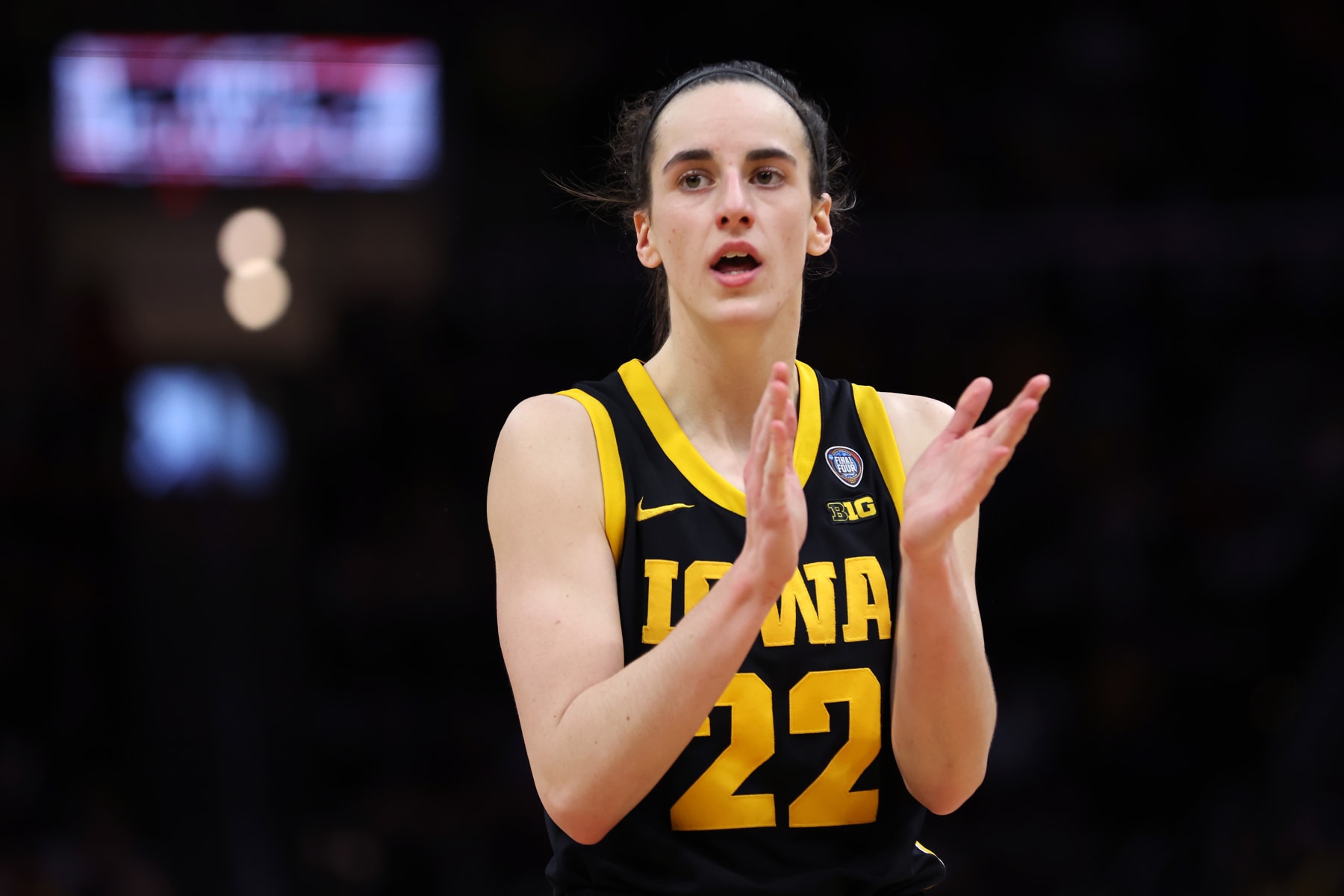 CLEVELAND, OHIO - APRIL 07: Caitlin Clark #22 of the Iowa Hawkeyes reacts in the second half during the 2024 NCAA Women's Basketball Tournament National Championship game against the South Carolina Gamecocks at Rocket Mortgage FieldHouse on April 07, 2024 in Cleveland, Ohio. (Photo by Steph Chambers/Getty Images)