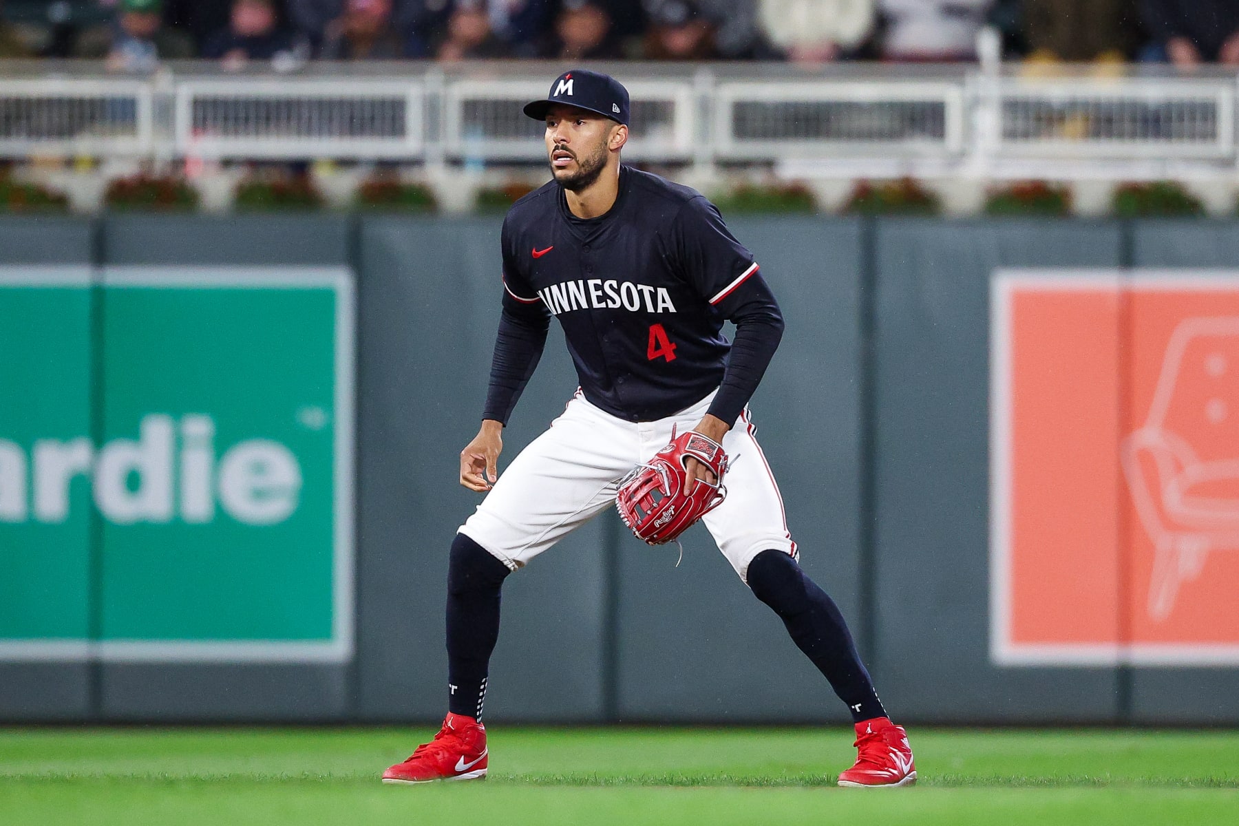 MINNEAPOLIS, MINNESOTA - APRIL 8: Carlos Correa #4 of the Minnesota Twins readies for play against the Los Angeles Dodgers during the eighth inning at Target Field on April 8, 2024 in Minneapolis, Minnesota. (Photo by Matt Krohn/Getty Images)