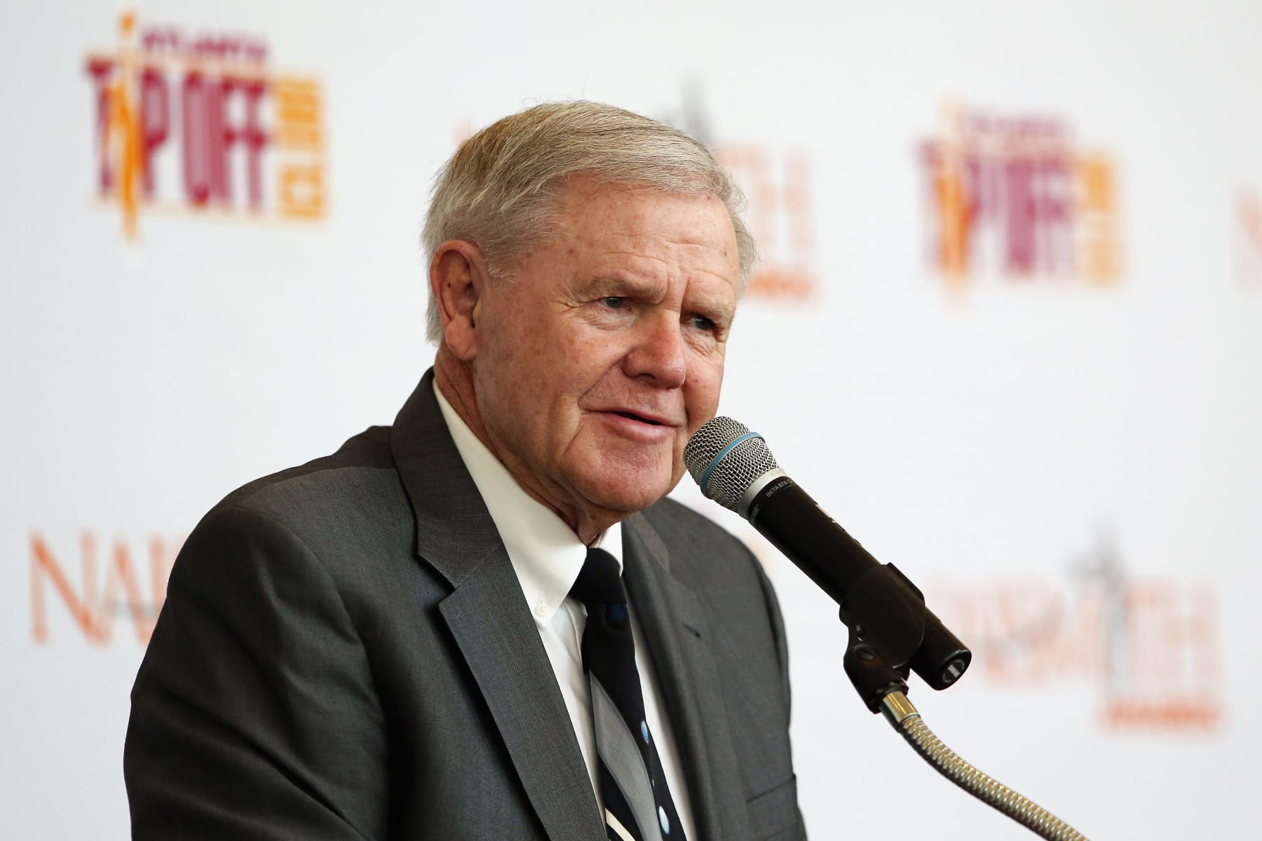 HOUSTON, TEXAS - APRIL 03:  Former head coach Denny Crum of the Louisville Cardinals speaks at the podium after being presented with the 2016 Naismith Outstanding Contributor to MenÂs Basketball Award during the 2016 Naismith Awards Brunch at Hobby Center for the Performing Arts on April 3, 2016 in Houston, Texas.  (Photo by Tim Bradbury/Getty Images)