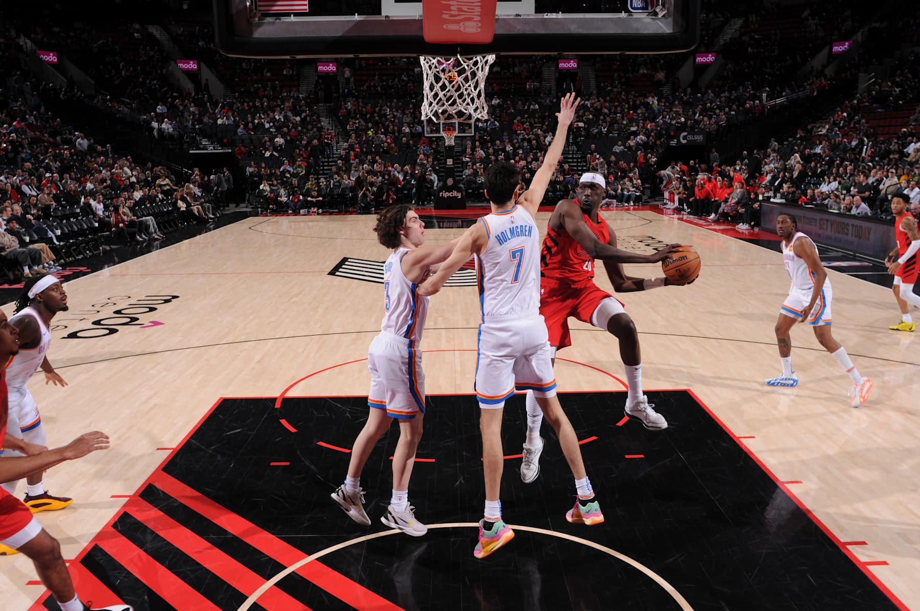 PORTLAND, OR - MARCH 6: Duop Reath #26 of the Portland Trail Blazers handles the ball during the game against the Oklahoma City Thunder on March 6, 2024 at the Moda Center Arena in Portland, Oregon. NOTE TO USER: User expressly acknowledges and agrees that, by downloading and or using this photograph, user is consenting to the terms and conditions of the Getty Images License Agreement. Mandatory Copyright Notice: Copyright 2024 NBAE (Photo by Cameron Browne/NBAE via Getty Images)