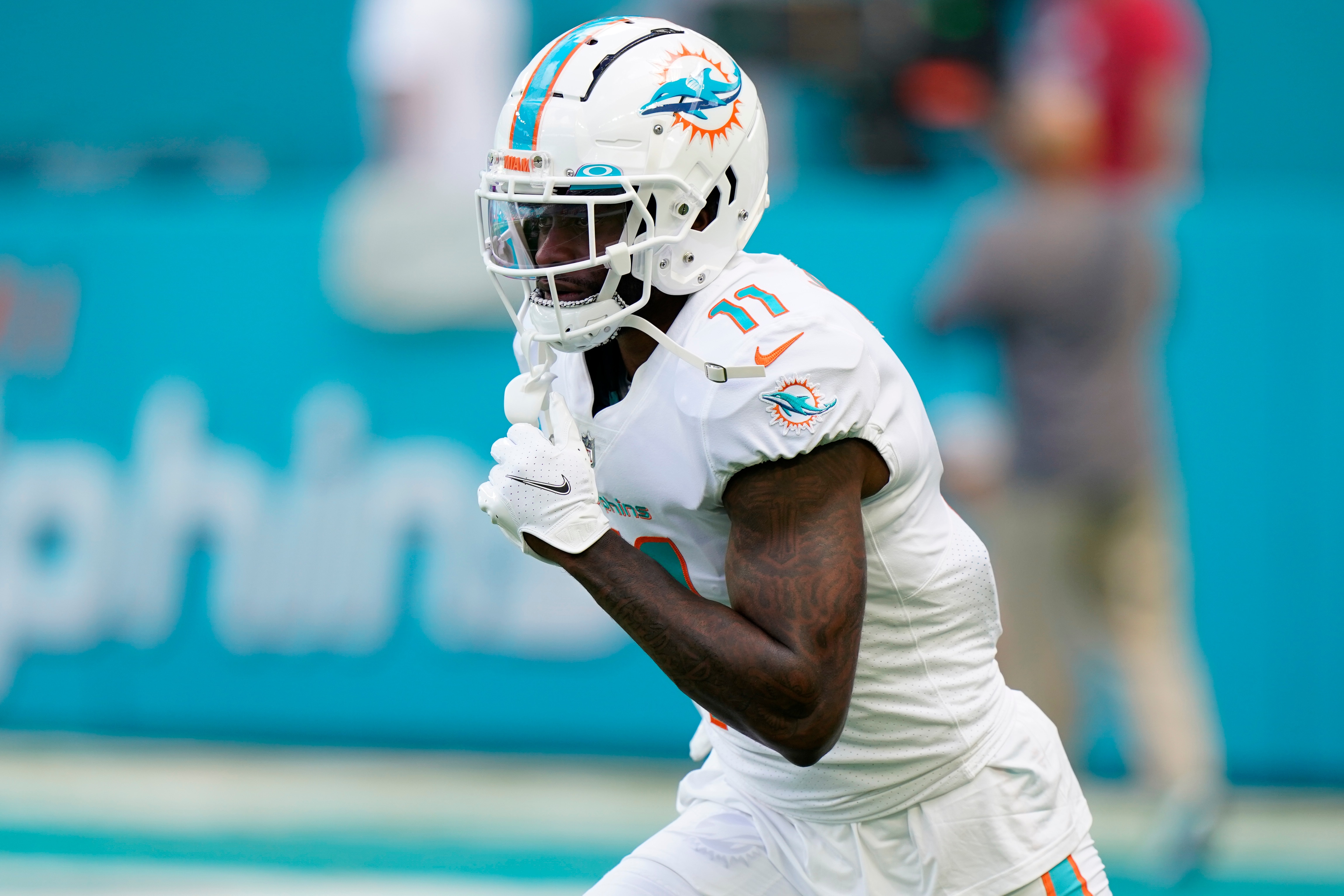 Miami Dolphins wide receiver DeVante Parker (11) warms up before an NFL football game against the New York Giants, Sunday, Dec. 5, 2021, in Miami Gardens, Fla. (AP Photo/Wilfredo Lee)