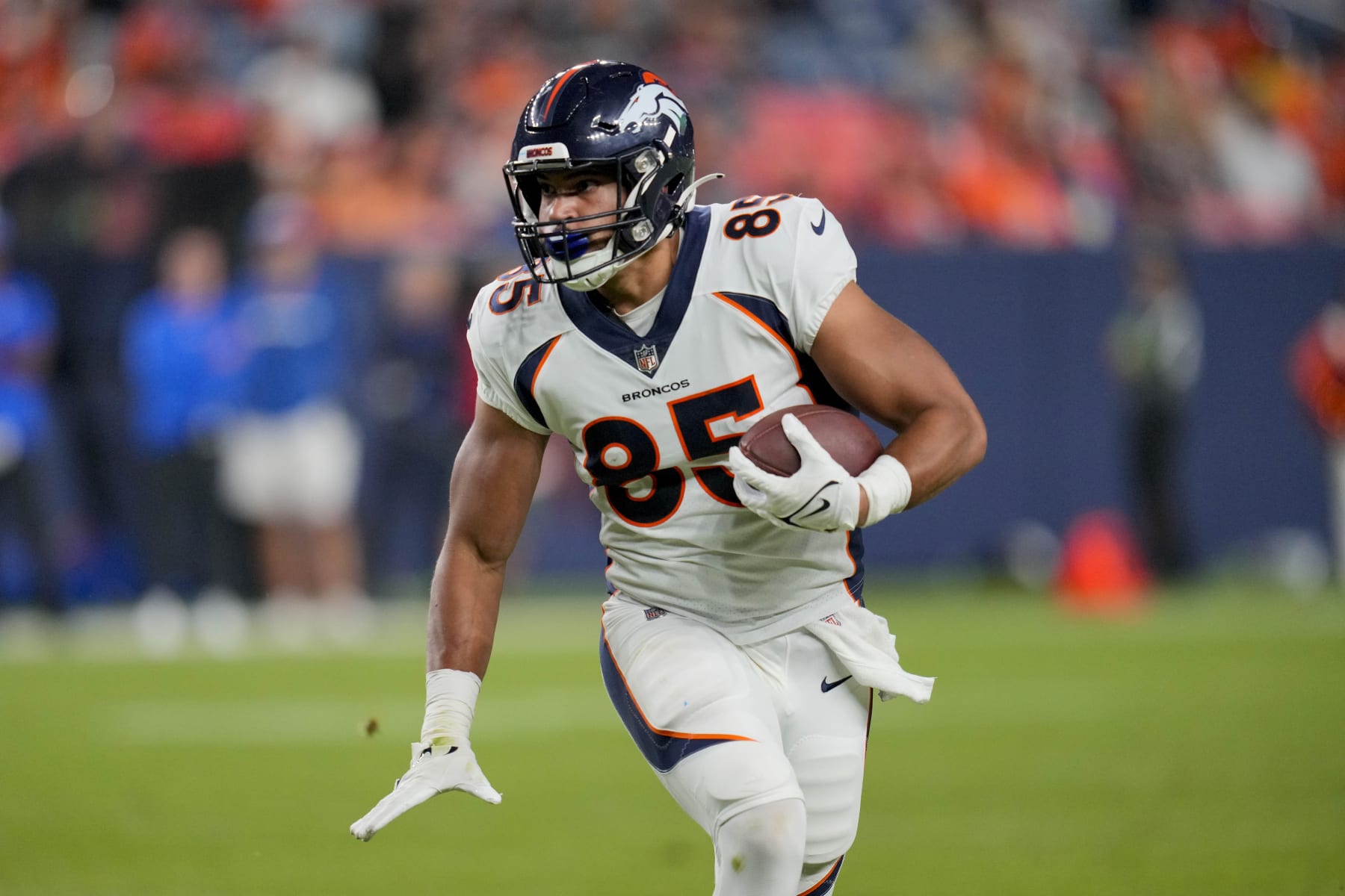 Denver Broncos tight end Albert Okwuegbunam (85) runs against the Los Angeles Rams during a preseason NFL football game Saturday, Aug. 26, 2023, in Denver. (AP Photo/Jack Dempsey)