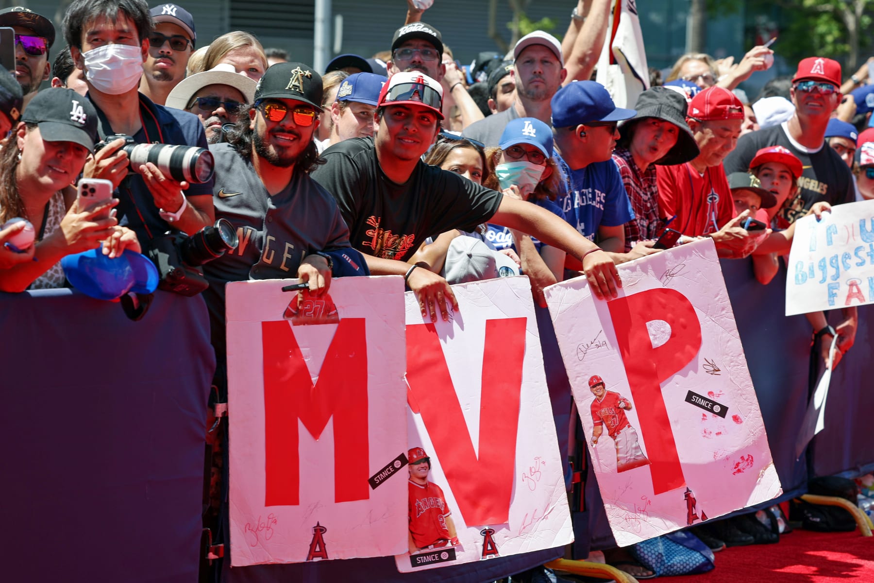 LOS ANGELES, CA - JULY 19:   Fans hold a MVP sign for during the All-Star Red Carpet Show at L.A. Live on Tuesday, July 19, 2022 in Los Angeles, California. (Photo by Mary DeCicco/MLB Photos via Getty Images)