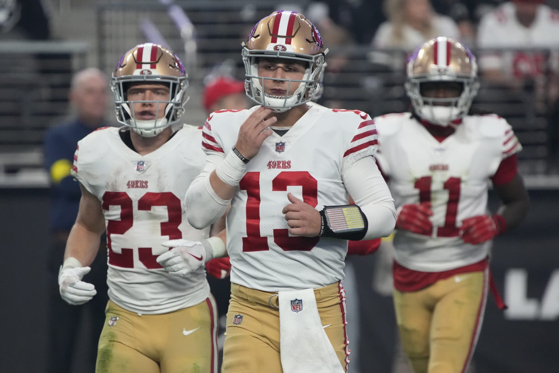 San Francisco 49ers quarterback Brock Purdy (13) leads his team out against the Las Vegas Raiders during the first half of an NFL football game, Sunday, Jan. 1, 2023, in Las Vegas. (AP Photo/Rick Scuteri)