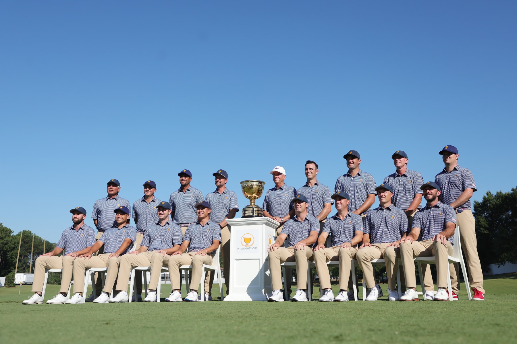 CHARLOTTE, NORTH CAROLINA - SEPTEMBER 21: (Back L-R) United State team members Assistant Captain Fred Couples, Kevin Kisner, Tony Finau, Assistant Captain Webb Simpson, Captain Davis Love III, Billy Horschel, Scottie Scheffler, Assistant Captain Steve Stricker, Assistant Captain Zach Johnson, (Front L-R) Cameron Young, Xander Schauffele, Patrick Cantlay, Collin Morikawa, Sam Burns, Justin Thomas, Jordan Spieth and Max Homa pose for a team photo prior to the 2022 Presidents Cup at Quail Hollow Country Club on September 21, 2022 in Charlotte, North Carolina. (Photo by Stacy Revere/Getty Images)