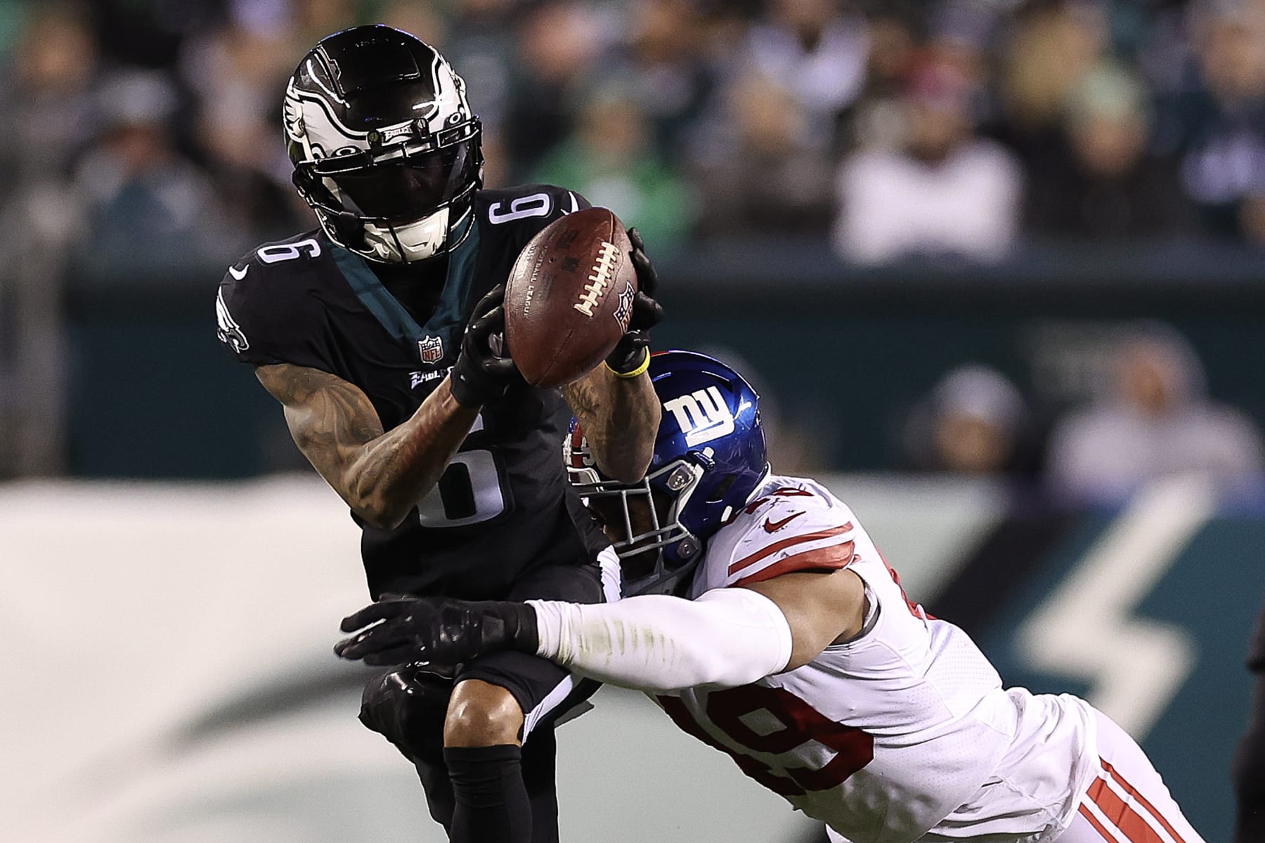 PHILADELPHIA, PENNSYLVANIA - JANUARY 08: DeVonta Smith #6 of the Philadelphia Eagles catches a pass in front of Tomon Fox #49 of the New York Giants during the third quarter at Lincoln Financial Field on January 08, 2023 in Philadelphia, Pennsylvania. (Photo by Tim Nwachukwu/Getty Images)