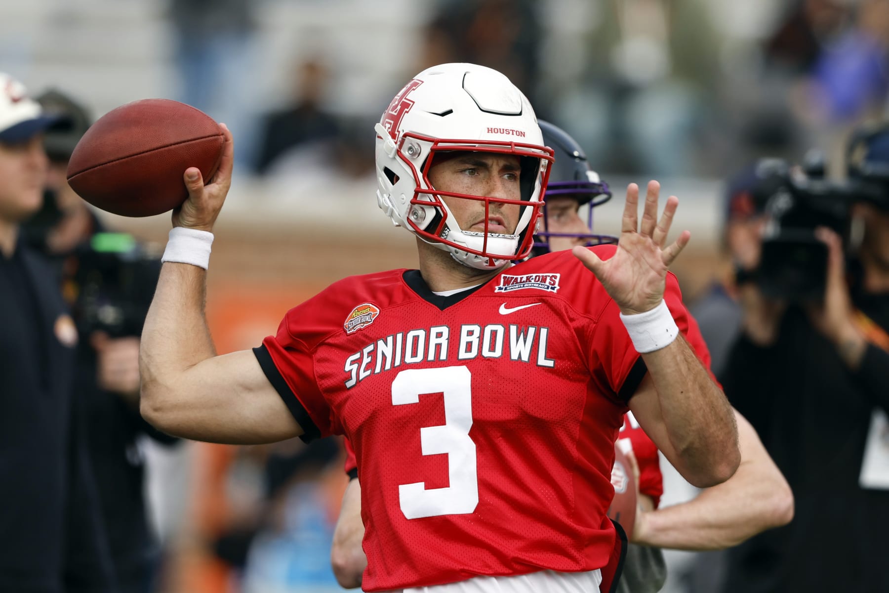 American quarterback Clayton Tune of Houston throws a pass during practice for the Senior Bowl NCAA college football game, Wednesday, Feb. 1, 2023, in Mobile, Ala.. (AP Photo/Butch Dill)