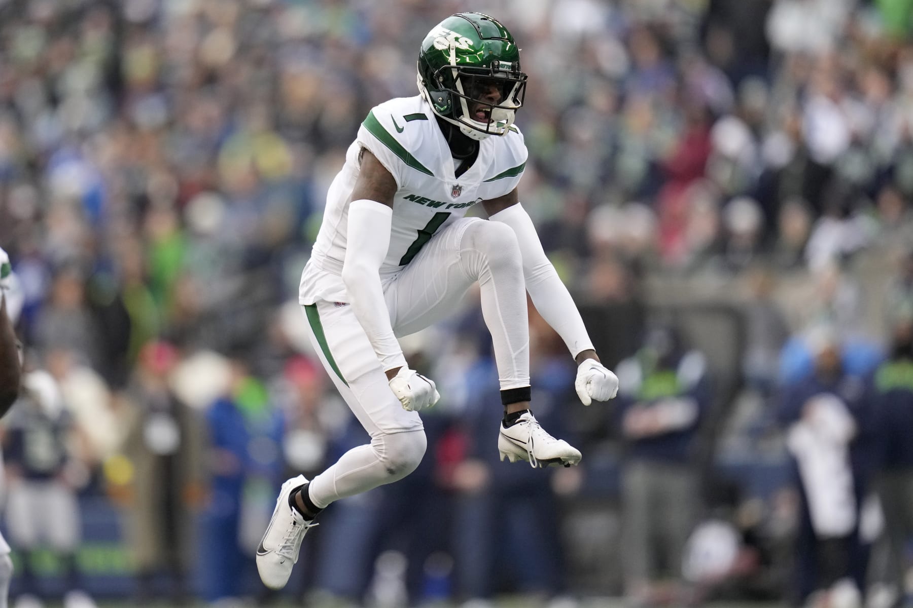 New York Jets cornerback Sauce Gardner (1) celebrates a defensive stop against the Seattle Seahawks during the first half of an NFL football game, Sunday, Jan. 1, 2023, in Seattle. (AP Photo/Godofredo A. Vásquez) New York Jets cornerback Sauce Gardner (1) celebrates a defensive stop against the Seattle Seahawks during the first half of an NFL football game, Sunday, Jan. 1, 2023, in Seattle. (AP Photo/Godofredo A. Vásquez)