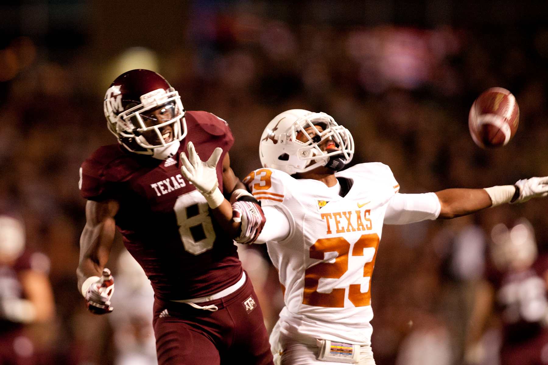 Carrington Byndom #23 of the Texas Longhorns breaks up a pass intended for Jeff Fuller #8 of the Texas A&M the last time these two teams met in 2011. 