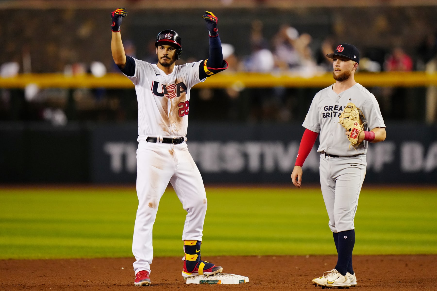 PHOENIX, AZ - MARCH 11:  Nolan Arenado #28 of Team USA reacts to hitting a RBI double in the third inning during Game 2 of Pool C between Team Great Britain and Team USA at Chase Field on Saturday, March 11, 2023 in Phoenix, Arizona. (Photo by Daniel Shirey/WBCI/MLB Photos via Getty Images)