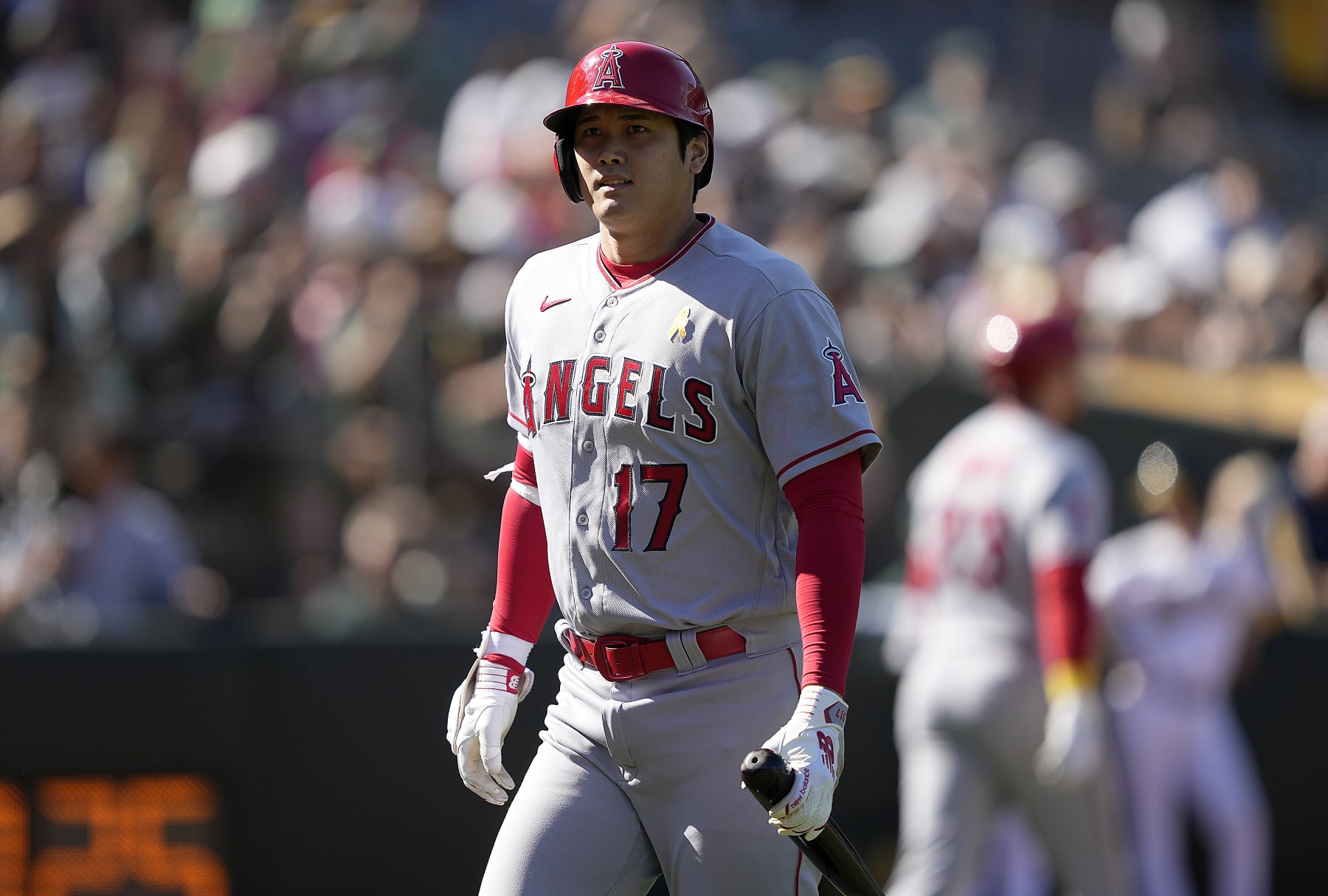 OAKLAND, CALIFORNIA - SEPTEMBER 03: Shohei Ohtani #17 of the Los Angeles Angels walks back to the dugout after striking out swinging against the Oakland Athletics in the top of the ninth inning at RingCentral Coliseum on September 03, 2023 in Oakland, California. Atheltics won the game 10-6. (Photo by Thearon W. Henderson/Getty Images)
