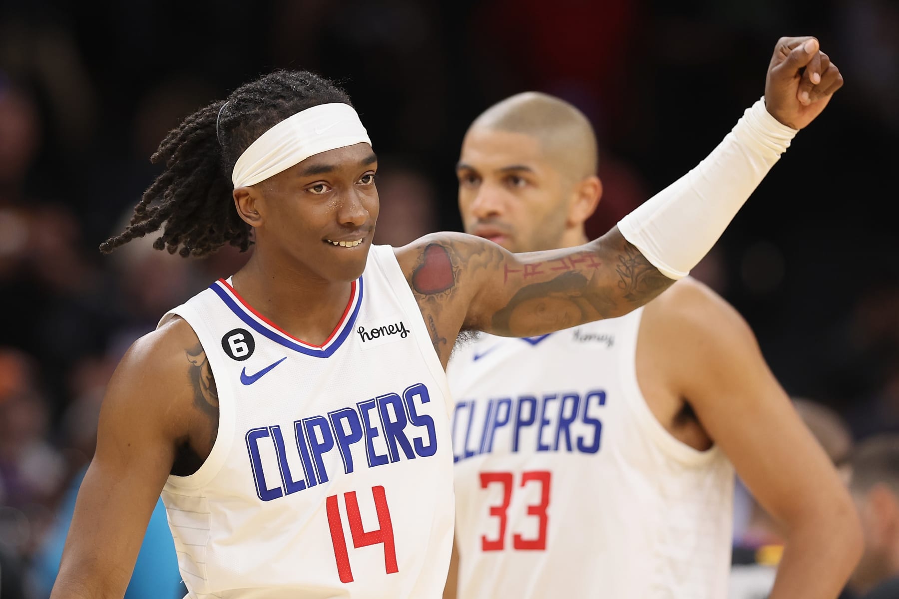 PHOENIX, ARIZONA - APRIL 16:  Terance Mann #14 of the LA Clippers celebrates following Game One of the Western Conference First Round Playoffs at Footprint Center on April 16, 2023 in Phoenix, Arizona.  The Clippers defeated the Suns 115-110. NOTE TO USER: User expressly acknowledges and agrees that, by downloading and or using this photograph, User is consenting to the terms and conditions of the Getty Images License Agreement.  (Photo by Christian Petersen/Getty Images)