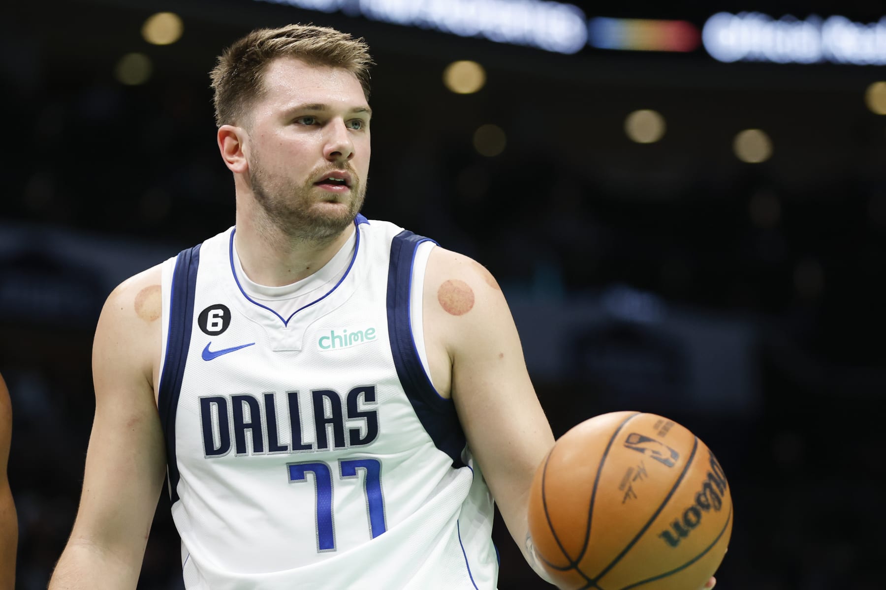 Dallas Mavericks guard Luka Doncic stands on the court during the first half of an NBA basketball game against the Charlotte Hornets in Charlotte, N.C., Sunday, March 26, 2023. (AP Photo/Nell Redmond)