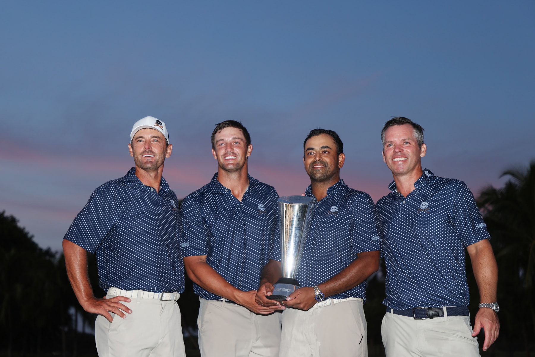 DORAL, FLORIDA - OCTOBER 22: Charles Howell III of Crushers GC, Captain Bryson DeChambeau of Crushers GC, Anirban Lahiri of Crushers GC and Paul Casey of Crushers GC celebrate after winning the team championship on Day Three of the LIV Golf Invitational - Miami at Trump National Doral Miami on October 22, 2023 in Doral, Florida. (Photo by Cliff Hawkins/Getty Images)