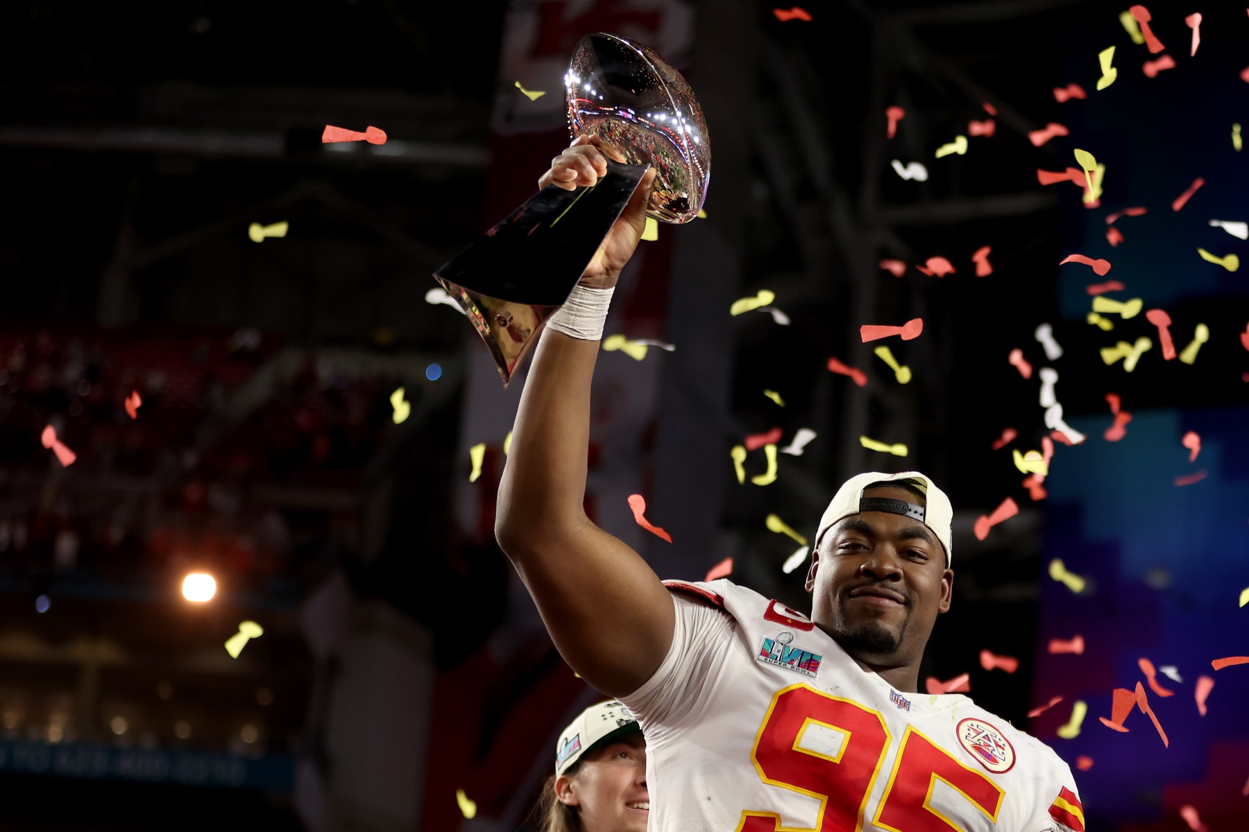 GLENDALE, ARIZONA - FEBRUARY 12:  Chris Jones #95 of the Kansas City Chiefs celebrates with The Vince Lombardi Trophy after defeating the Philadelphia Eagles 38 to 35 in Super Bowl LVII at State Farm Stadium on February 12, 2023 in Glendale, Arizona. (Photo by Gregory Shamus/Getty Images)