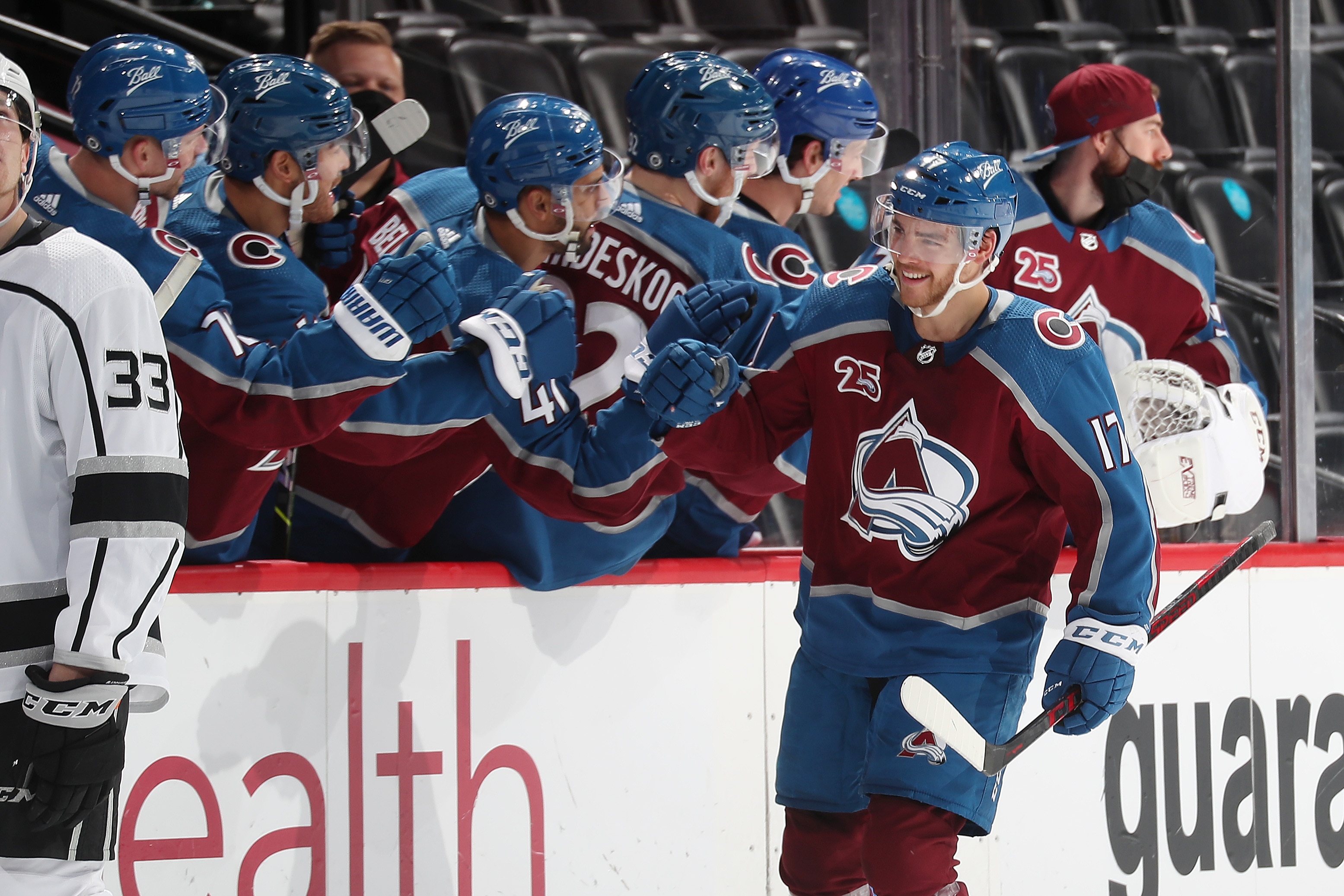 DENVER, COLORADO - MAY 13: Tyson Jost #17 of the Colorado Avalanche celebrates a goal against the Los Angeles Kings with his bench at Ball Arena on May 13, 2021 in Denver, Colorado. (Photo by Michael Martin/NHLI via Getty Images)