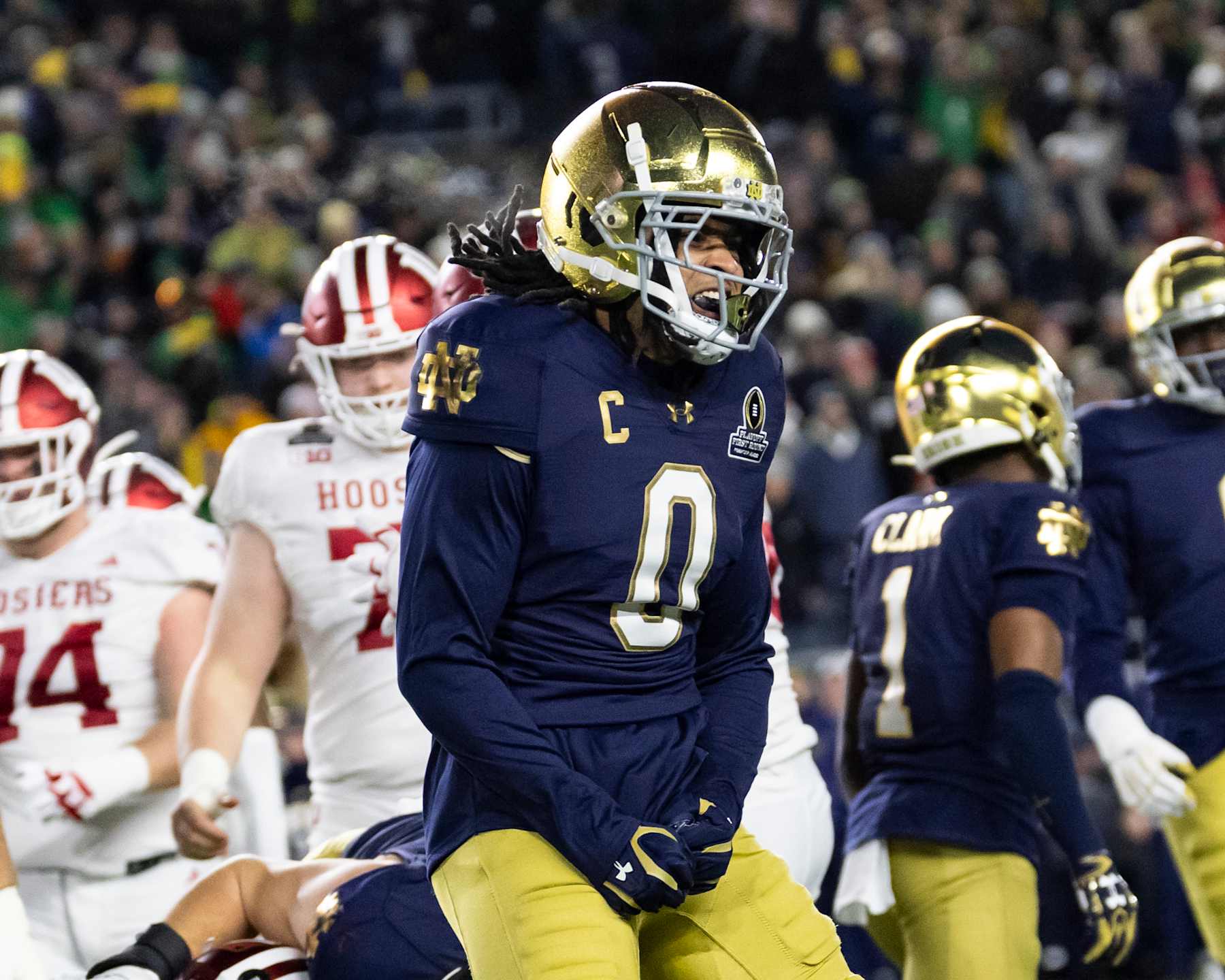 SOUTH BEND, INDIANA - DECEMBER 20: Xavier Watts #0 of the Notre Dame Fighting Irish celebrates a stop during a game between the Indiana Hoosiers and the Notre Dame Fighting Irish at Notre Dame Stadium on December 20, 2024 in South Bend, Indiana. (Photo by Steve Limentani/ISI Photos/Getty Images)