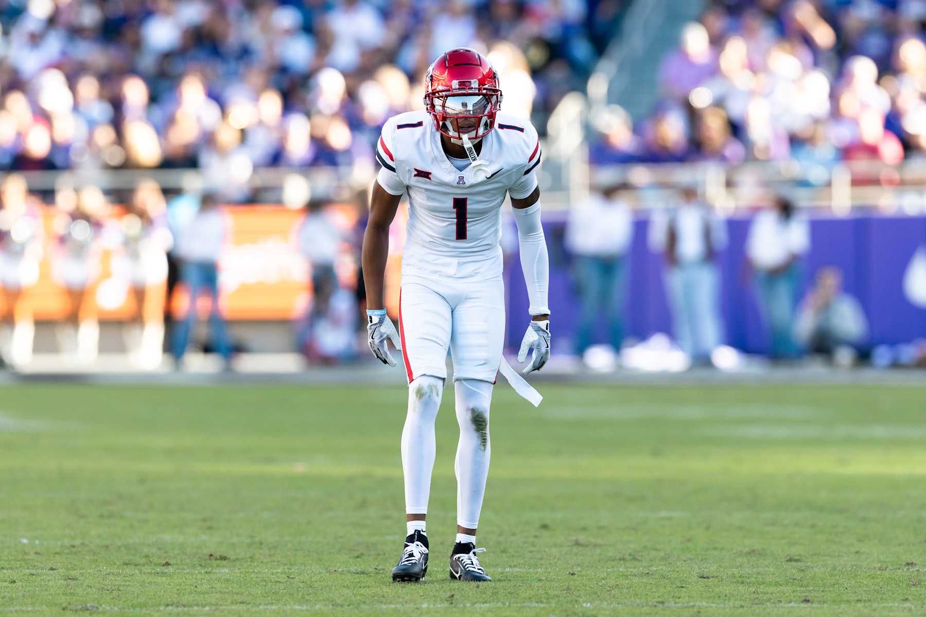 FORT WORTH, TX - NOVEMBER 23: Arizona Wildcats defensive back Tacario Davis (#1) looks up field during the Big 12 college football game between the Arizona Wildcats and TCU Horned Frogs on November 23, 2024 at Amon G. Carter Stadium in Fort Worth, TX.  (Photo by Matthew Visinsky/Icon Sportswire via Getty Images)