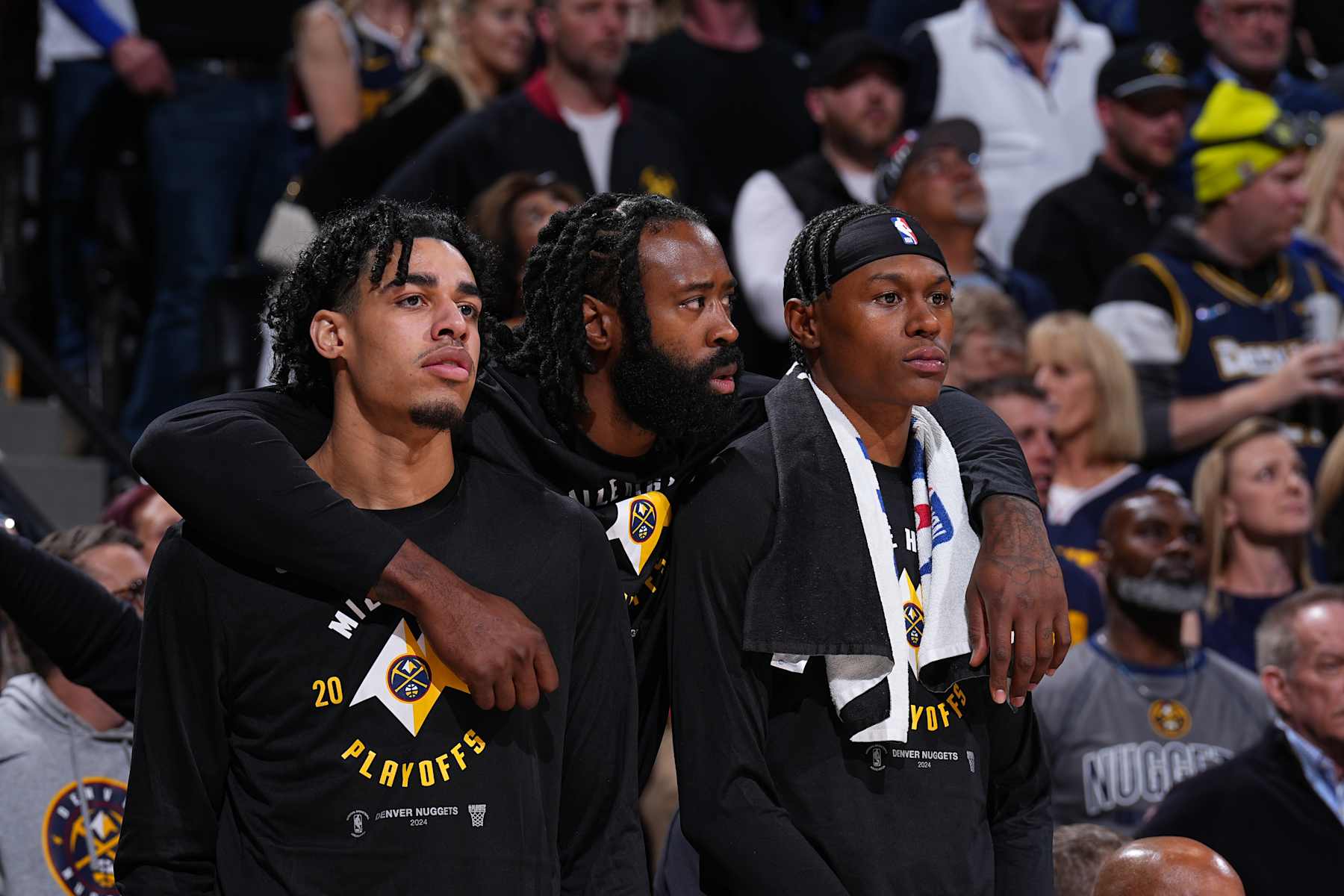 DENVER, CO - APRRIL 22: Julian Strawther #3, DeAndre Jordan #6, and Peyton Watson #8 of the Denver Nuggets look on during the game against the Los Angeles Lakers during Round 1 Game 2 of the 2024 NBA Playoffs on April 22, 2024 at the Ball Arena in Denver, Colorado. NOTE TO USER: User expressly acknowledges and agrees that, by downloading and/or using this Photograph, user is consenting to the terms and conditions of the Getty Images License Agreement. Mandatory Copyright Notice: Copyright 2024 NBAE (Photo by Garrett Ellwood/NBAE via Getty Images)