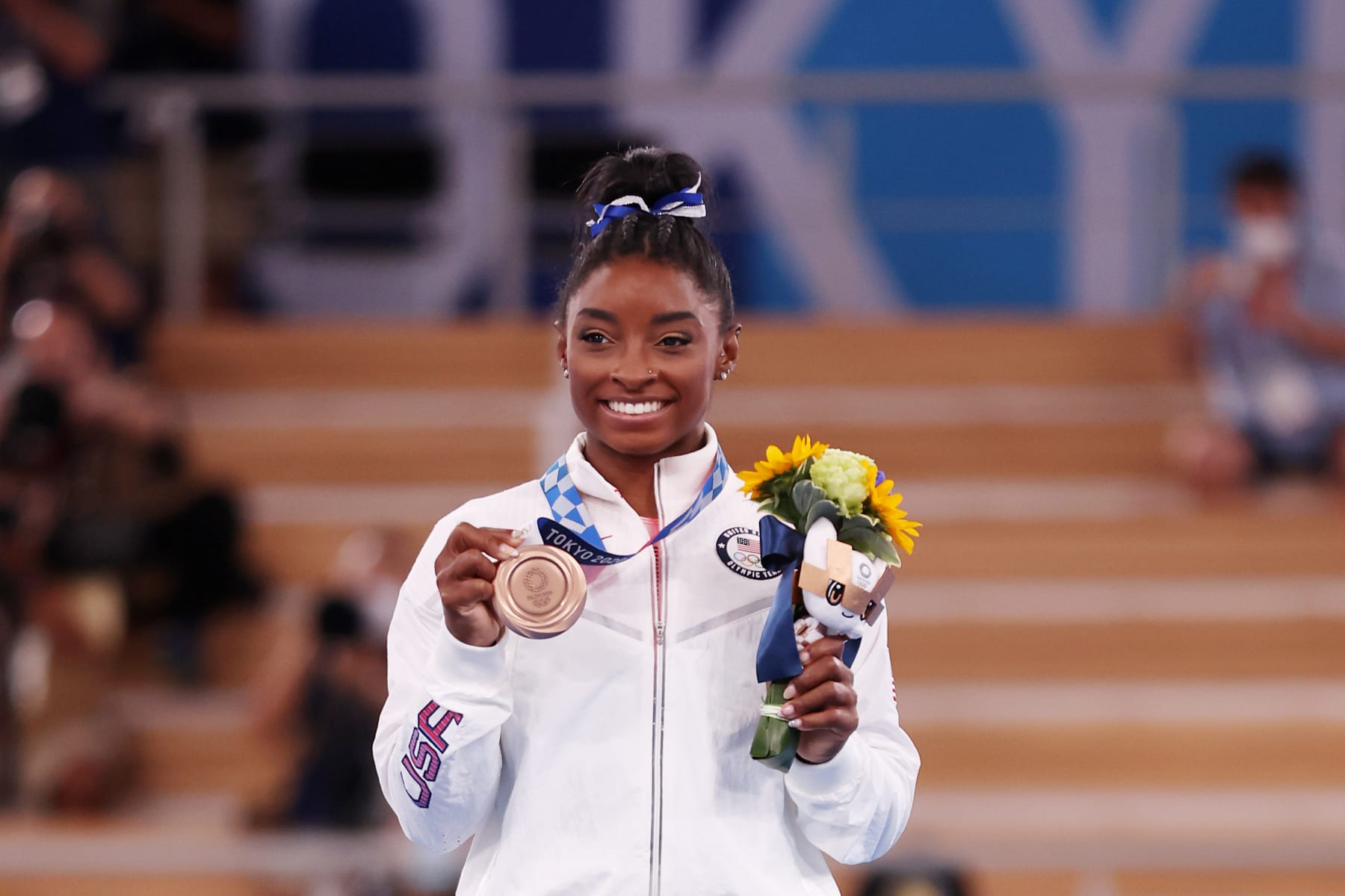 TOKYO, JAPAN - AUGUST 03: Simone Biles of Team United States poses with the bronze medal during the Women's Balance Beam Final medal ceremony on day eleven of the Tokyo 2020 Olympic Games at Ariake Gymnastics Centre on August 03, 2021 in Tokyo, Japan. (Photo by Jamie Squire/Getty Images)