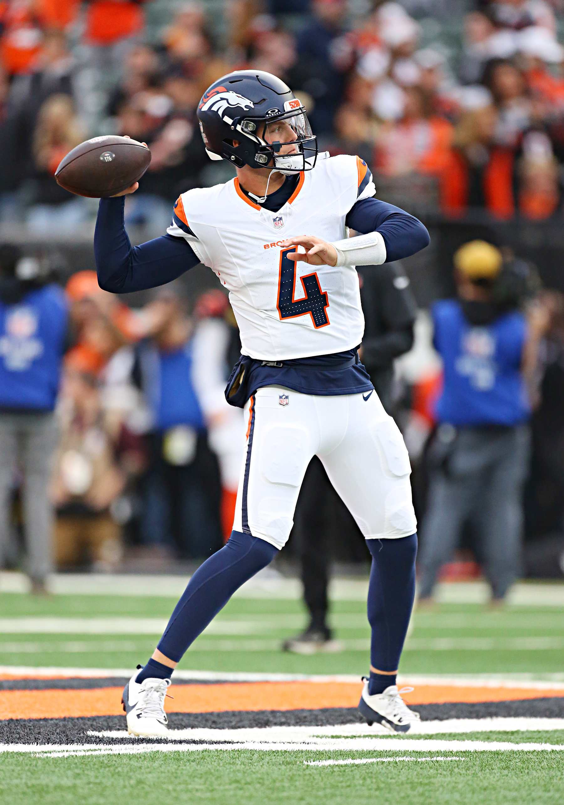 CINCINNATI, OH - DECEMBER 28 - Denver Broncos quarterback Zach Wilson (4) warms up before a game between the Denver Broncos and the Cincinnati Bengals at Paycor Stadium on Saturday, December 28, 2024. (Photo by Jeff Moreland/Icon Sportswire via Getty Images)