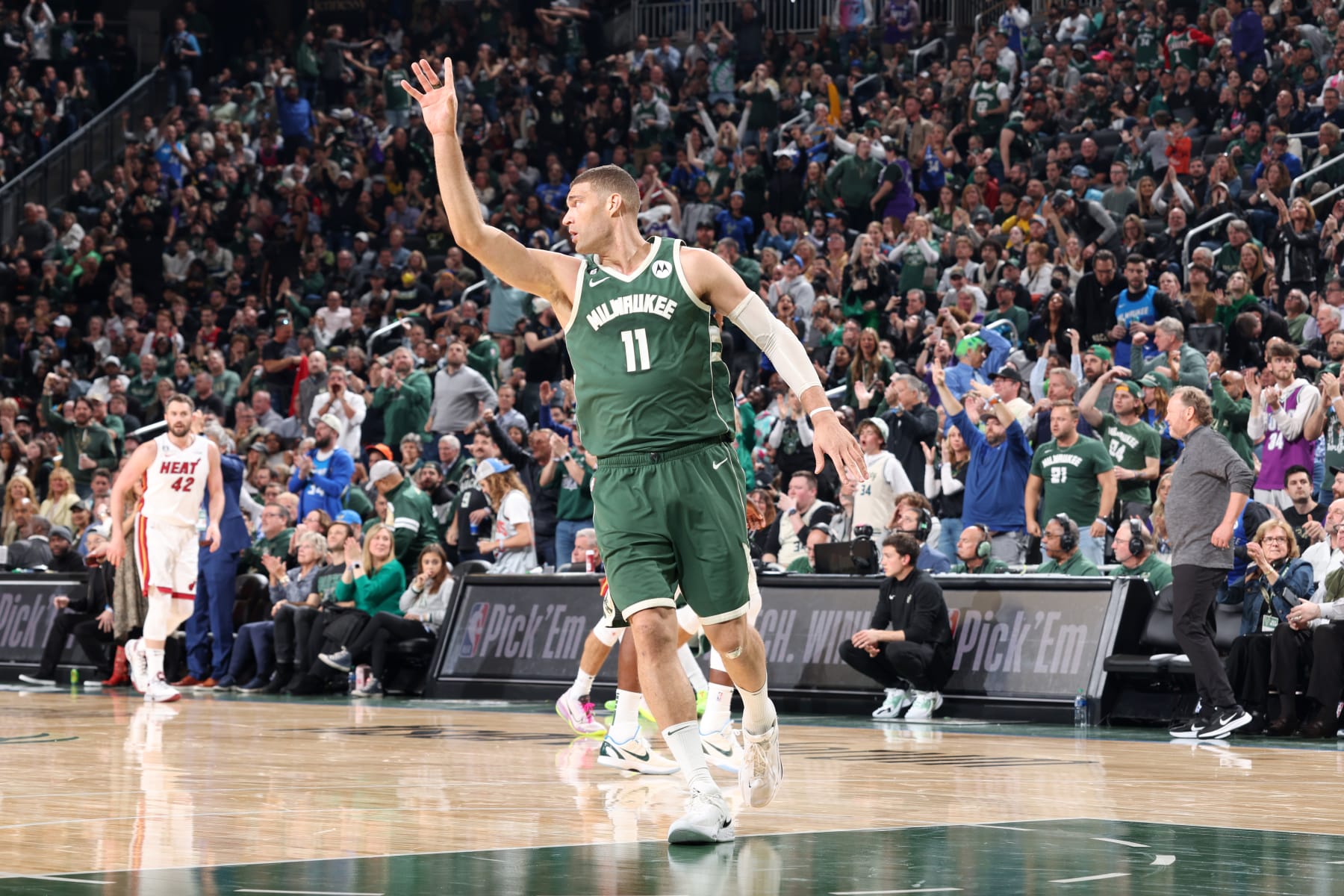 MILWAUKEE, WI - APRIL 26: Brook Lopez #11 of the Milwaukee Bucks reacts during the game against the Miami Heat during Round 1 Game 5 of the 2023 NBA Playoffs on April 26, 2023 at the Fiserv Forum Center in Milwaukee, Wisconsin. NOTE TO USER: User expressly acknowledges and agrees that, by downloading and or using this Photograph, user is consenting to the terms and conditions of the Getty Images License Agreement. Mandatory Copyright Notice: Copyright 2023 NBAE (Photo by Jeff Haynes/NBAE via Getty Images).