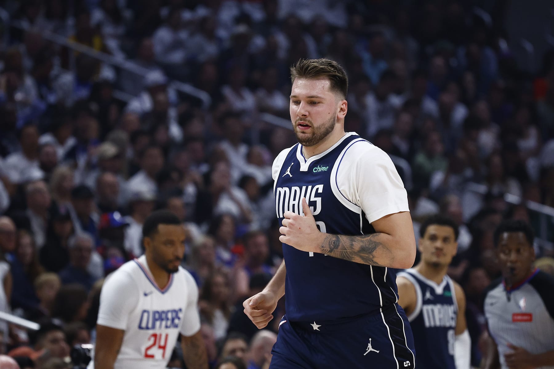 LOS ANGELES, CALIFORNIA - MAY 01:  Luka Doncic #77 of the Dallas Mavericks during game five of the Western Conference First Round Playoffs at Crypto.com Arena on May 01, 2024 in Los Angeles, California.  NOTE TO USER: User expressly acknowledges and agrees that, by downloading and/or using this photograph, user is consenting to the terms and conditions of the Getty Images License Agreement.  (Photo by Ronald Martinez/Getty Images)