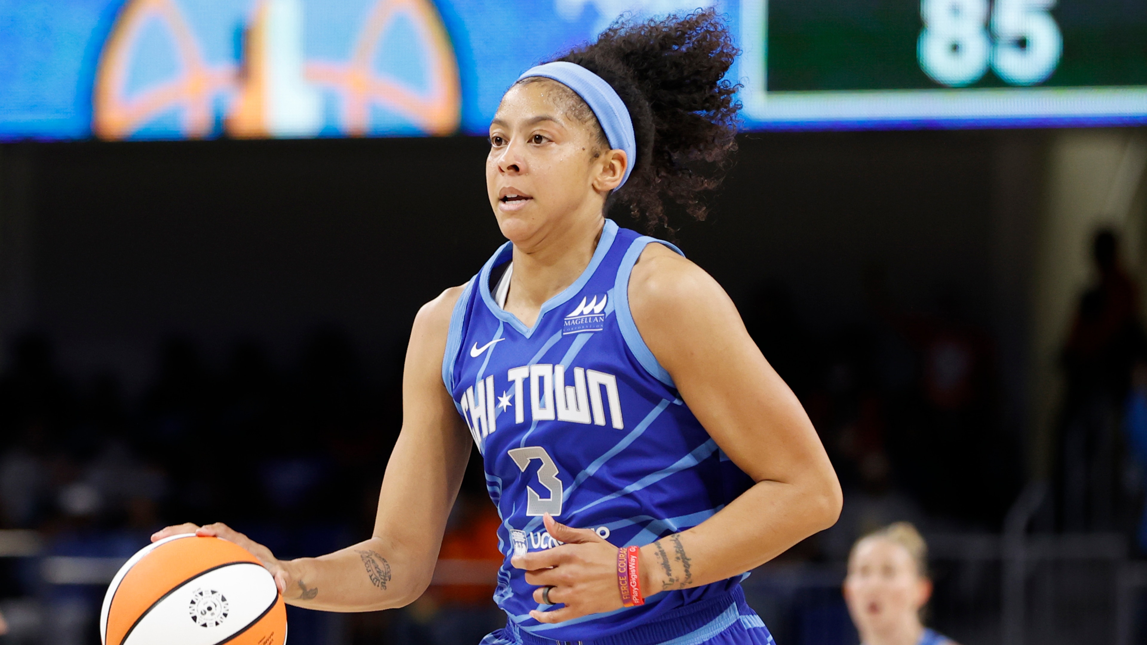 Chicago Sky forward Candace Parker brings the ball up court against the Los Angels Sparks during the second half of the WNBA basketball game, Friday, May 6, 2022, in Chicago. (AP Photo/Kamil Krzaczynski)