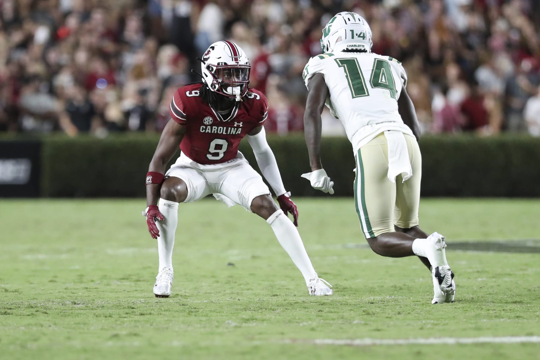 South Carolina defensive back Cam Smith (9) defends Charlotte wide receiver Grant DuBose (14) during an NCAA college football game on Saturday, Sept. 24, 2022, in Columbia, S.C. South Carolina won 56-20. (AP Photo/Artie Walker Jr.)