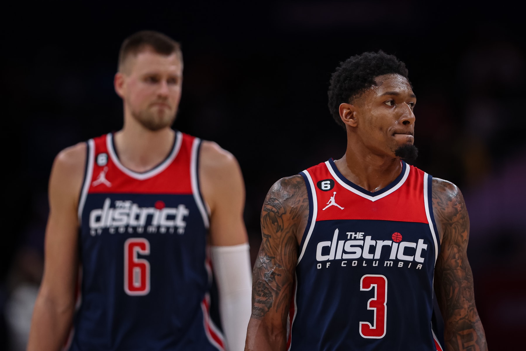 WASHINGTON, DC - OCTOBER 31: Bradley Beal #3 and Kristaps Porzingis #6 of the Washington Wizards look on during the second half against the Philadelphia 76ers at Capital One Arena on October 31, 2022 in Washington, DC. NOTE TO USER: User expressly acknowledges and agrees that, by downloading and or using this photograph, User is consenting to the terms and conditions of the Getty Images License Agreement. (Photo by Scott Taetsch/Getty Images)
