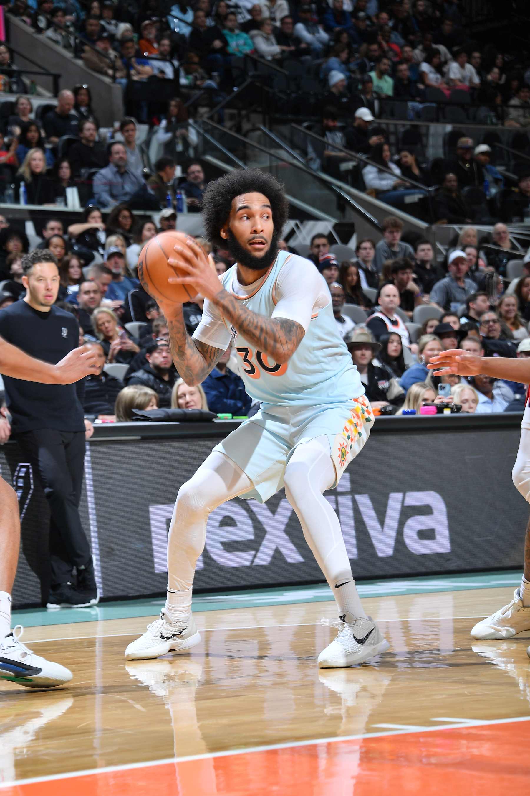 SAN ANTONIO, TX - DECEMBER 8: Julian Champagnie #30 of the San Antonio Spurs handles the ball during the game against the New Orleans Pelicans on December 8, 2024 at the Frost Bank Center in San Antonio, Texas. NOTE TO USER: User expressly acknowledges and agrees that, by downloading and or using this photograph, user is consenting to the terms and conditions of the Getty Images License Agreement. Mandatory Copyright Notice: Copyright 2024 NBAE (Photos by Michael Gonzales/NBAE via Getty Images)