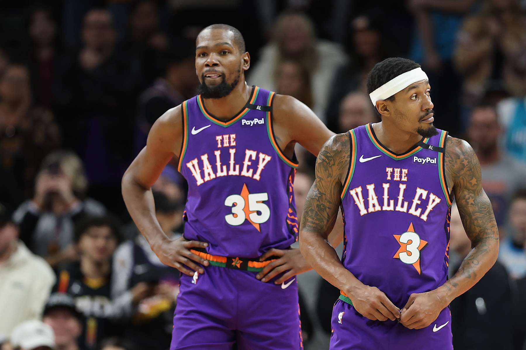 PHOENIX, ARIZONA - JANUARY 12: Kevin Durant #35 and Bradley Beal #3 of the Phoenix Suns during the second half of the NBA game at Footprint Center on January 12, 2025 in Phoenix, Arizona. The Suns defeated the Hornets 120-113. NOTE TO USER: User expressly acknowledges and agrees that, by downloading and or using this photograph, User is consenting to the terms and conditions of the Getty Images License Agreement.  (Photo by Christian Petersen/Getty Images)