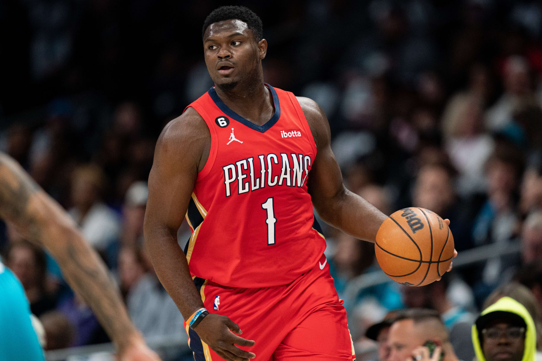 CHARLOTTE, NORTH CAROLINA - OCTOBER 21: Zion Williamson #1 of the New Orleans Pelicans brings the ball up court against the Charlotte Hornets in the first quarter during their game at Spectrum Center on October 21, 2022 in Charlotte, North Carolina. NOTE TO USER: User expressly acknowledges and agrees that, by downloading and or using this photograph, User is consenting to the terms and conditions of the Getty Images License Agreement. (Photo by Jacob Kupferman/Getty Images)