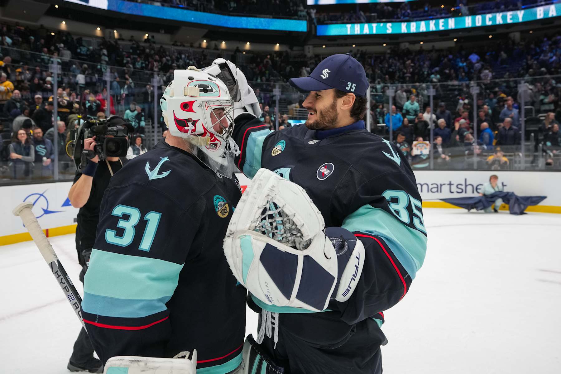 Philipp Grubauer and Joey Daccord.