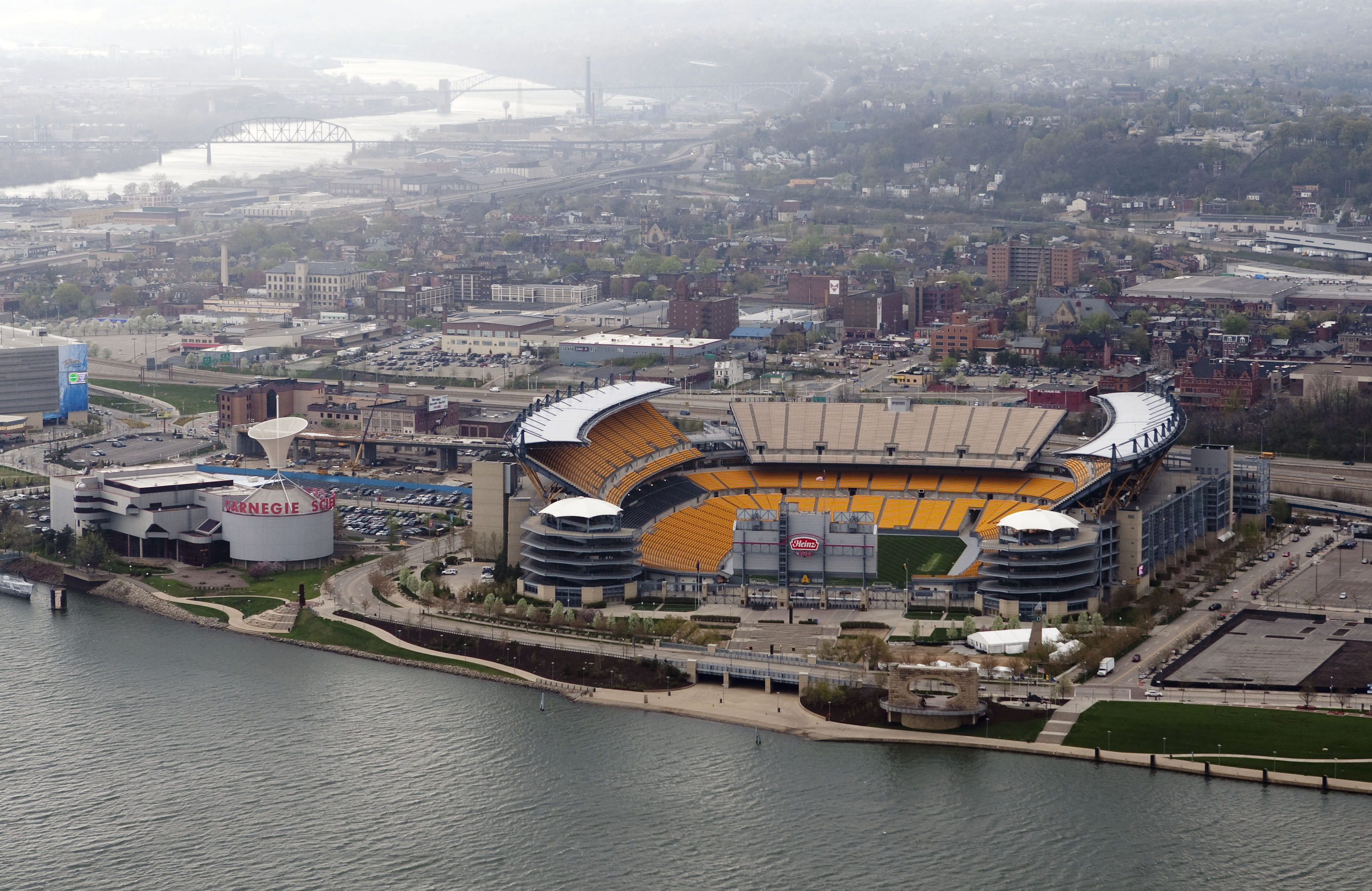 Heinz Field stands stands in Pittsburgh, Pennsylvania, U.S., in this aerial photo taken on Friday, April 9, 2010. Metropolitan areas in the U.S. with concentrations of manufacturing posted some of the biggest declines in population since 2000, according to government data. Pittsburgh showed the second-biggest population decline, losing about 76,000 residents. Photographer: Andrew Harrer/Bloomberg via Getty Images