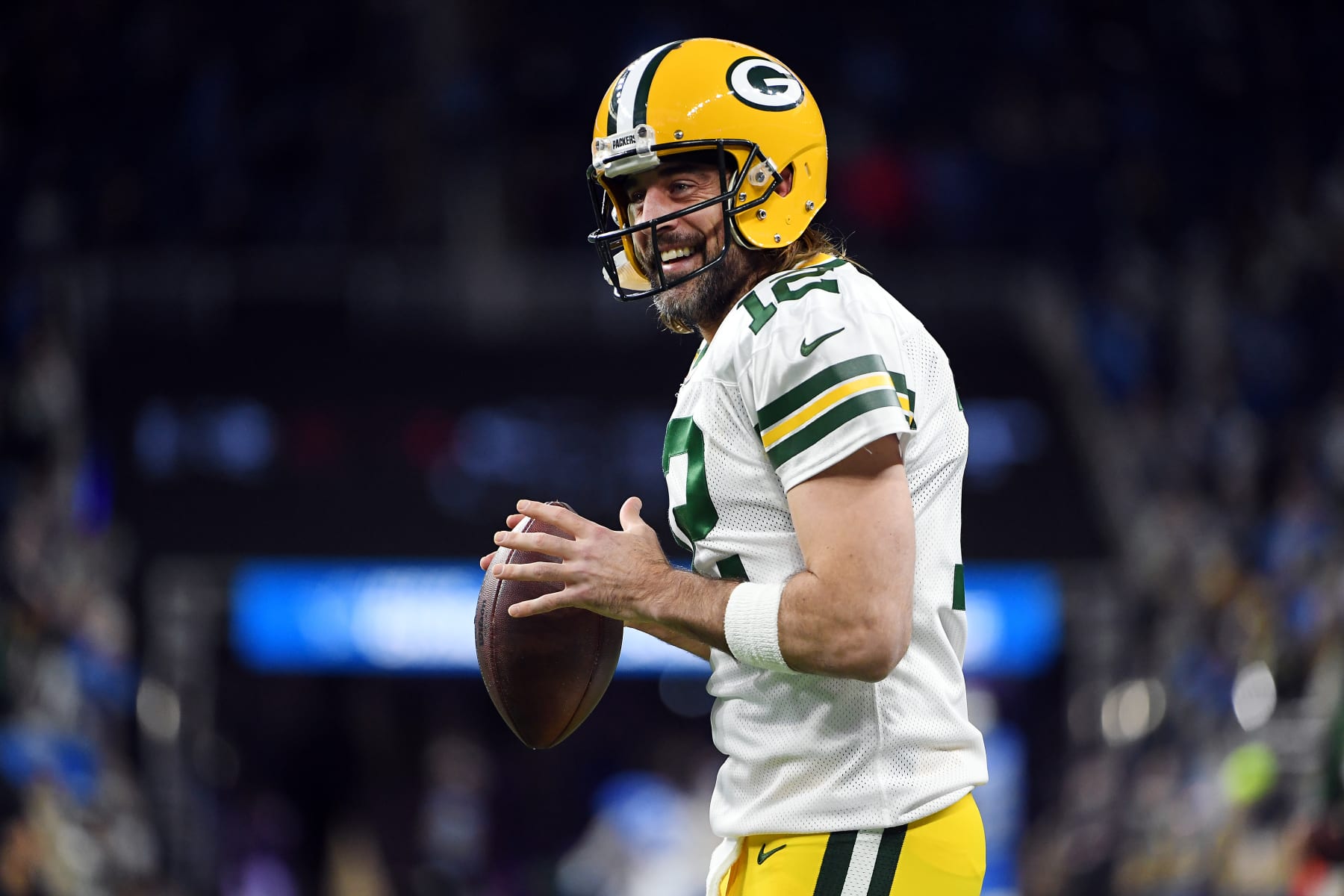 DETROIT, MICHIGAN - JANUARY 09: Aaron Rodgers #12 of the Green Bay Packers warms up prior to a game against the Detroit Lions at Ford Field on January 09, 2022 in Detroit, Michigan. (Photo by Nic Antaya/Getty Images)