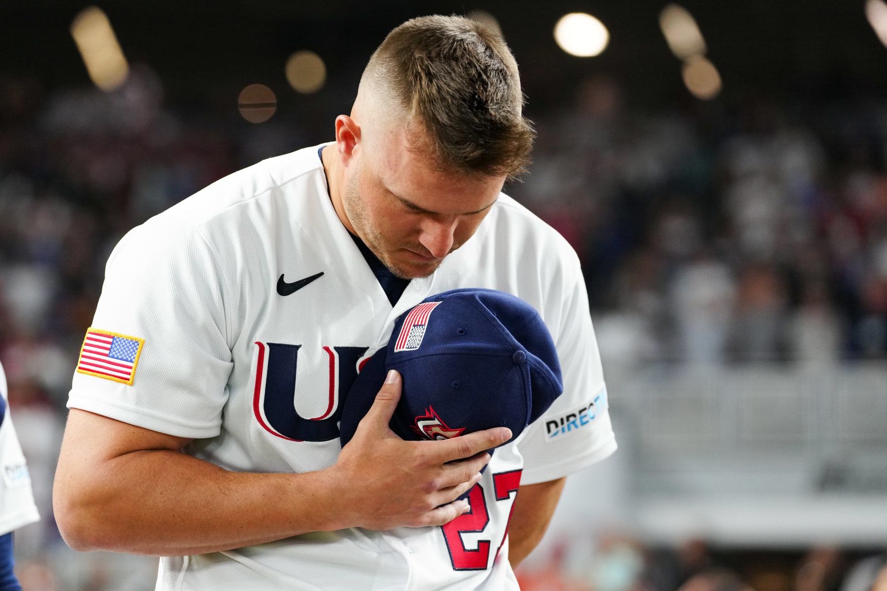 MIAMI, FL - MARCH 19:   Mike Trout #27 of Team USA stands on the field during the national anthem prior to the 2023 World Baseball Classic Semifinal game between Team Cuba and Team USA at loanDepot Park on Sunday, March 19, 2023 in Miami, Florida. (Photo by Mary DeCicco/WBCI/MLB Photos via Getty Images)