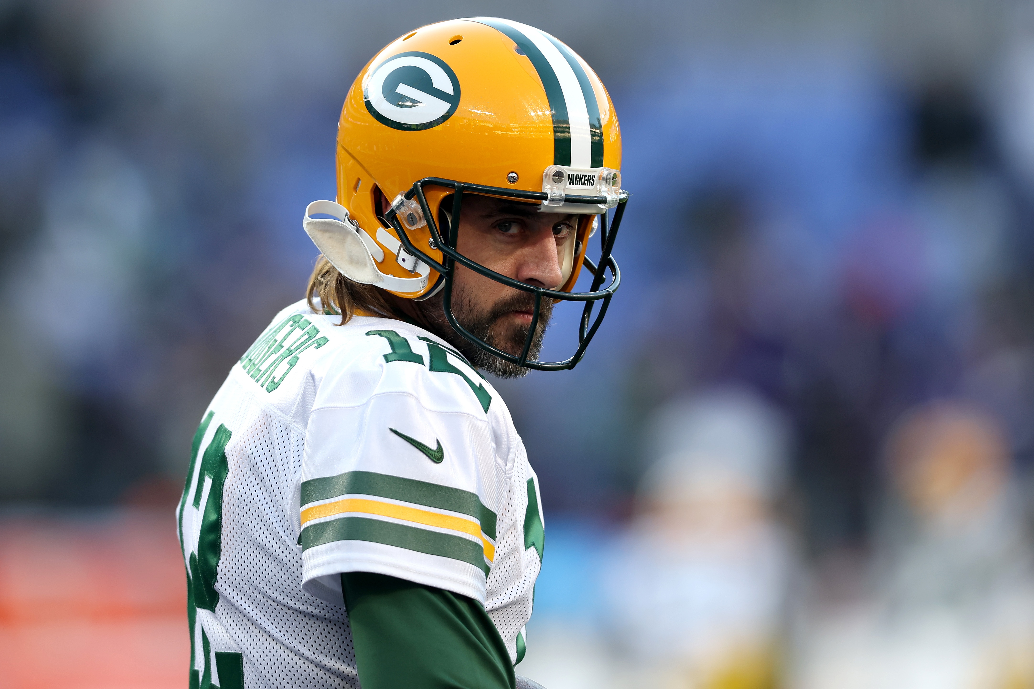 BALTIMORE, MARYLAND - DECEMBER 19: Aaron Rodgers #12 of the Green Bay Packers looks on during warm-up before the game against the Baltimore Ravens at M&T Bank Stadium on December 19, 2021 in Baltimore, Maryland. (Photo by Rob Carr/Getty Images)