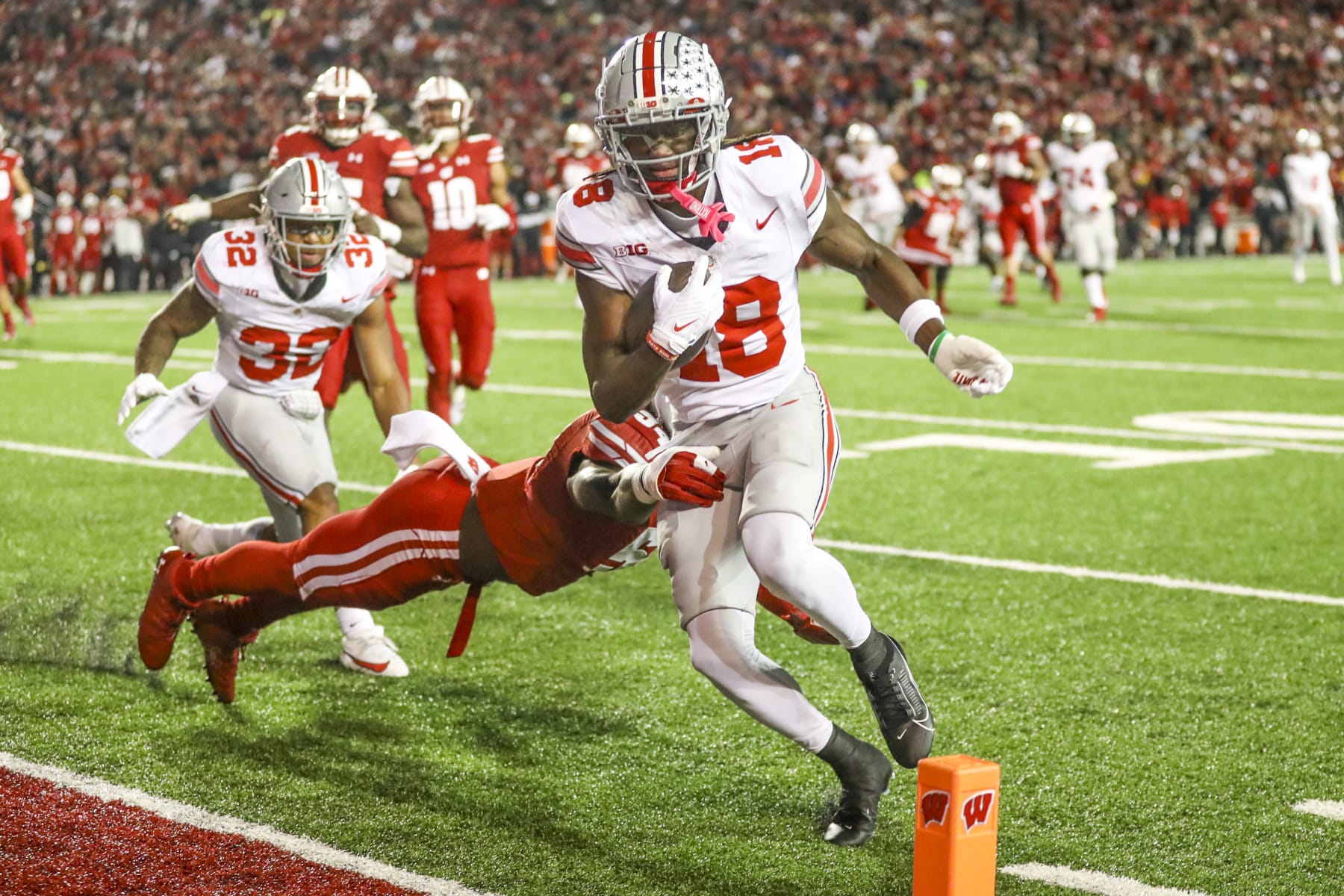 MADISON, WI - OCTOBER 28: Ohio State wide receiver Marvin Harrison Jr. (18) runs into the end zone for the first Ohio Sate touchdown during a college football game between the University of Wisconsin Badgers and the Ohio State University Buckeyes on October 28, 2023 at Camp Randall Stadium in Madison, WI. (Photo by Lawrence Iles/Icon Sportswire via Getty Images)
