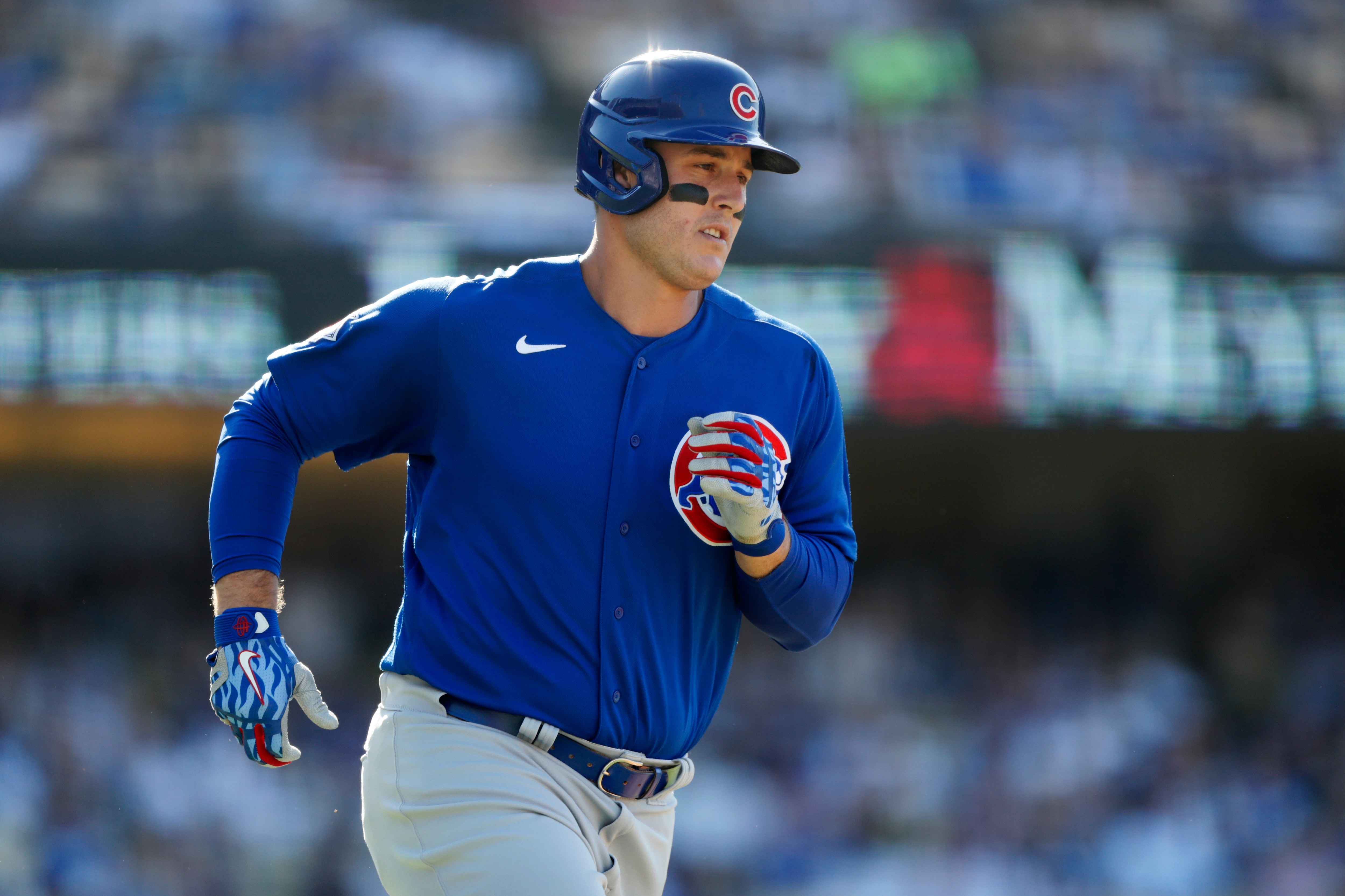 Chicago Cubs' Anthony Rizzo rounds first after hitting a solo home run against the Los Angeles Dodgers during the fourth inning of a baseball game in Los Angeles, Saturday, June 26, 2021. (AP Photo/Alex Gallardo)
