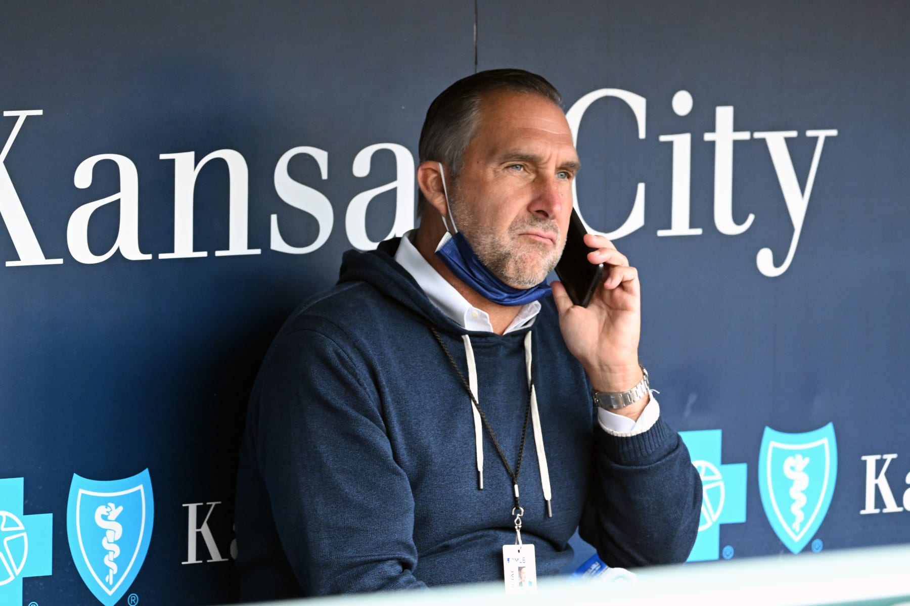 KANSAS CITY, MO - MAY 03: St. Louis Cardinals president of baseball operations John Mozeliak takes a call from the dugout before a MLB game between the St. Louis Cardinals  and the Kansas City Royals on May 03, 2022, at Kauffman Stadium, Kansas City, MO.  (Photo by Keith Gillett/Icon Sportswire via Getty Images),
