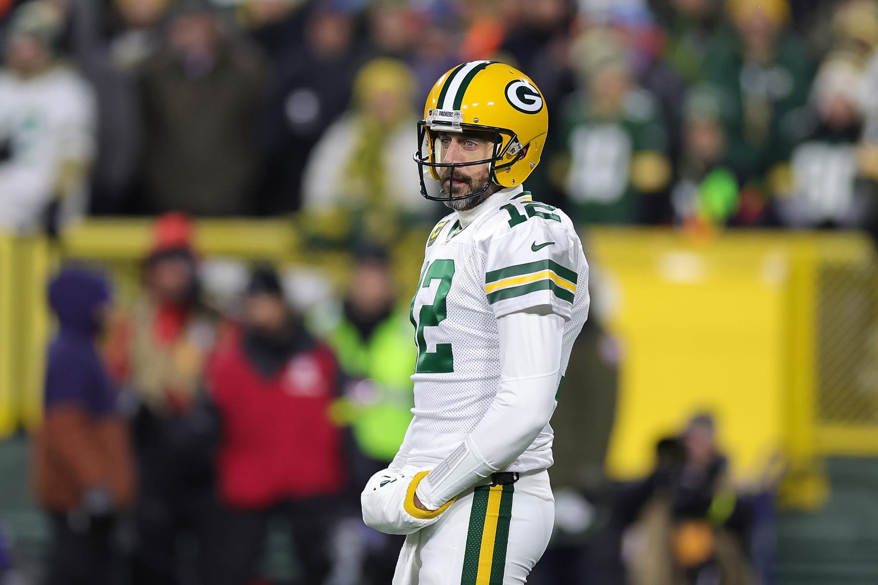 GREEN BAY, WISCONSIN - NOVEMBER 17: Aaron Rodgers #12 of the Green Bay Packers looks to the sideline during a game against the Tennessee Titans at Lambeau Field on November 17, 2022 in Green Bay, Wisconsin.  The Titans defeated the Packers 27-17. (Photo by Stacy Revere/Getty Images)