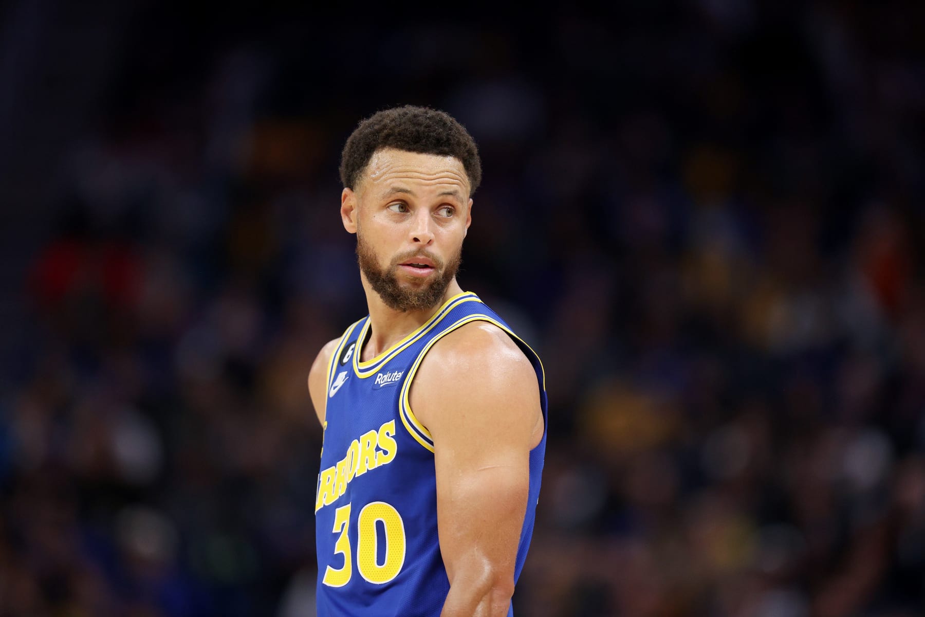 SAN FRANCISCO, CALIFORNIA - NOVEMBER 07: Stephen Curry #30 of the Golden State Warriors stands on the court during their game against the Sacramento Kings at Chase Center on November 07, 2022 in San Francisco, California. NOTE TO USER: User expressly acknowledges and agrees that, by downloading and or using this photograph, User is consenting to the terms and conditions of the Getty Images License Agreement.  (Photo by Ezra Shaw/Getty Images)