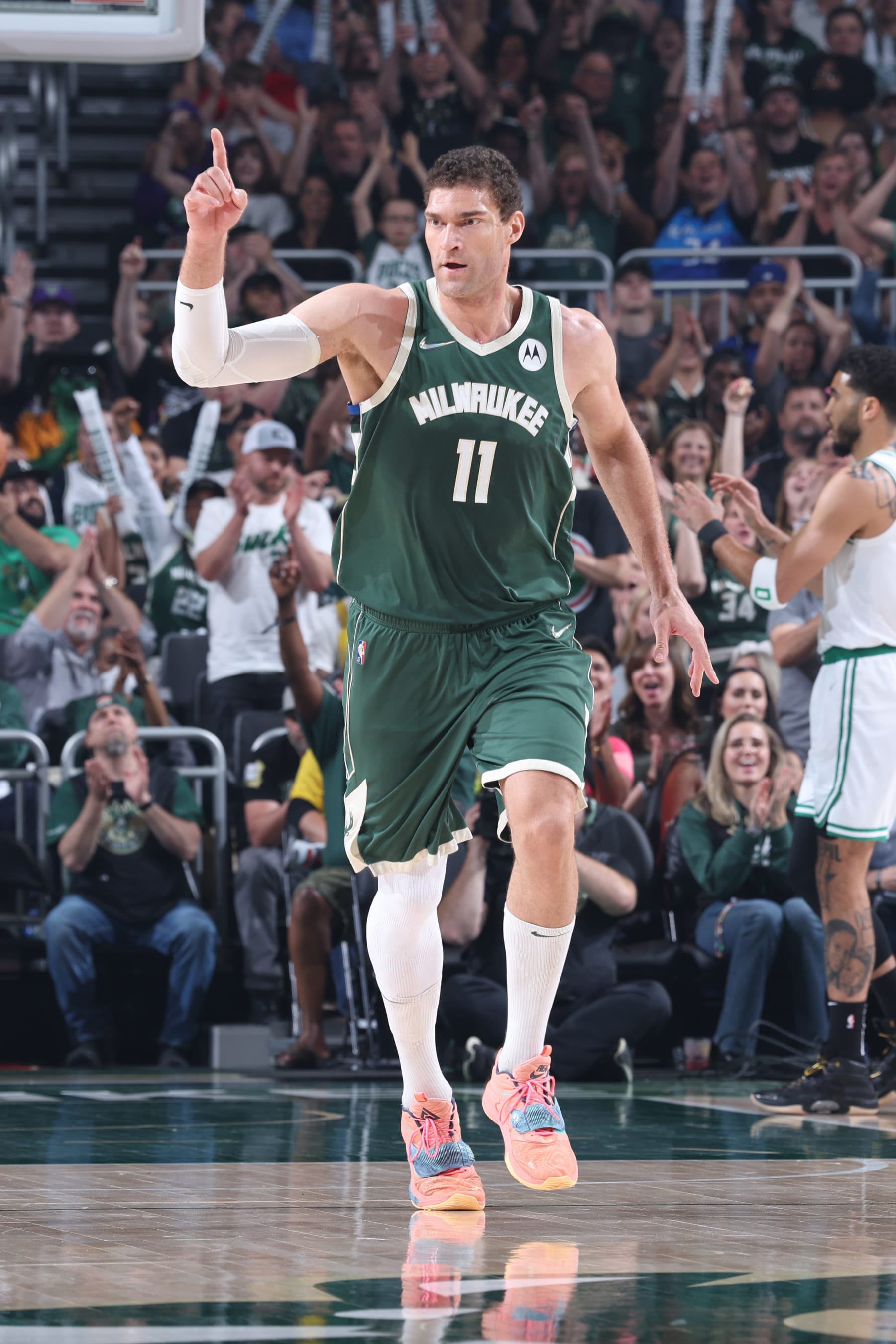 MILWAUKEE, WI - MAY 13: Brook Lopez #11 of the Milwaukee Bucks celebrates during Game 6 of the 2022 NBA Playoffs Eastern Conference Semifinals against the Boston Celtics on May 13, 2022 at the Fiserv Forum Center in Milwaukee, Wisconsin. NOTE TO USER: User expressly acknowledges and agrees that, by downloading and or using this Photograph, user is consenting to the terms and conditions of the Getty Images License Agreement. Mandatory Copyright Notice: Copyright 2022 NBAE (Photo by Jeff Haynes/NBAE via Getty Images).