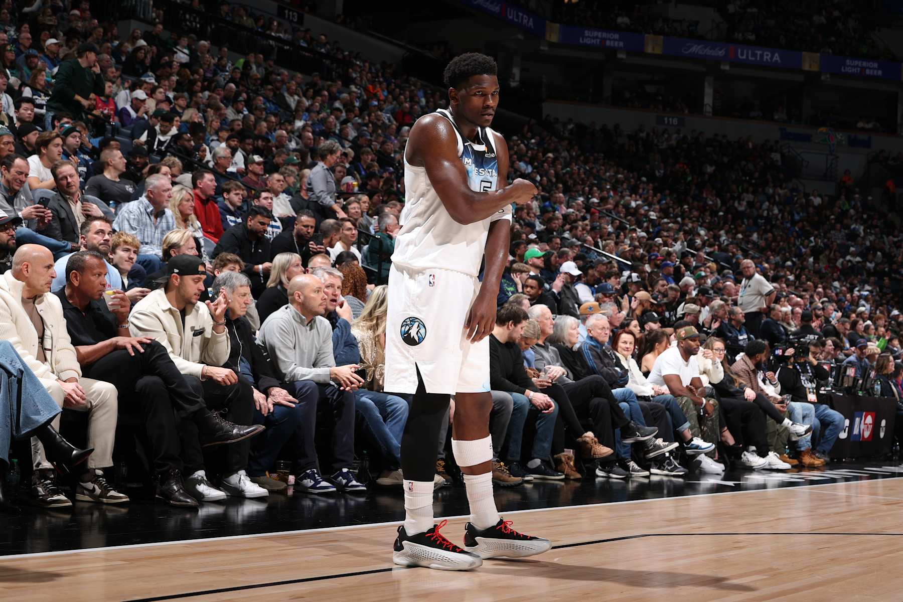 MINNEAPOLIS, MN -  DECEMBER 19: Anthony Edwards #5 of the Minnesota Timberwolves looks on during the game against the New York Knicks on December 19, 2024 at Target Center in Minneapolis, Minnesota. NOTE TO USER: User expressly acknowledges and agrees that, by downloading and or using this Photograph, user is consenting to the terms and conditions of the Getty Images License Agreement. Mandatory Copyright Notice: Copyright 2024 NBAE (Photo by David Sherman/NBAE via Getty Images)