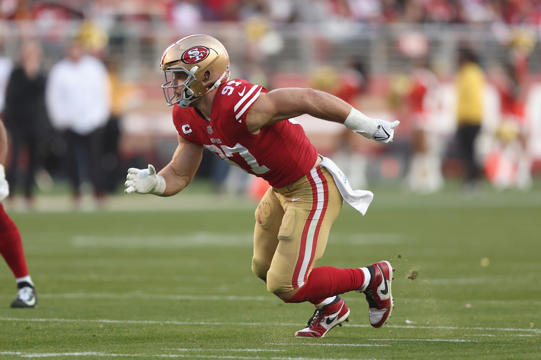 SANTA CLARA, CALIFORNIA - DECEMBER 24: Nick Bosa #97 of the San Francisco 49ers rushes the passer in the fourth quarter against the Washington Commanders at Levi's Stadium on December 24, 2022 in Santa Clara, California. (Photo by Lachlan Cunningham/Getty Images)