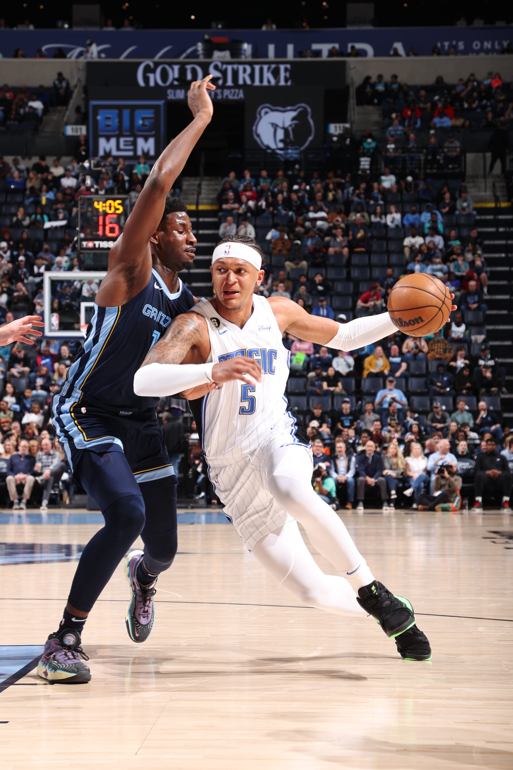 MEMPHIS, TN - MARCH 28: Paolo Banchero #5 of the Orlando Magic drives to the basket during the game against the Memphis Grizzlies on March 28, 2023 at FedExForum in Memphis, Tennessee. NOTE TO USER: User expressly acknowledges and agrees that, by downloading and or using this photograph, User is consenting to the terms and conditions of the Getty Images License Agreement. Mandatory Copyright Notice: Copyright 2023 NBAE (Photo by Joe Murphy/NBAE via Getty Images)