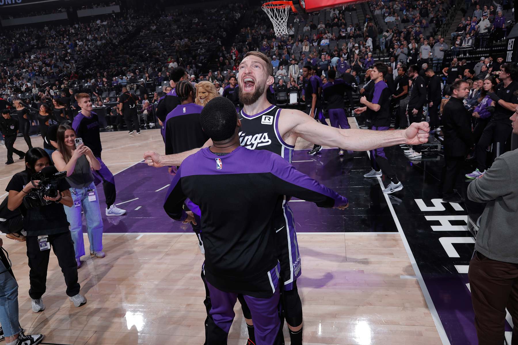 SACRAMENTO, CA - JANUARY 16: Domantas Sabonis #11 and De'Aaron Fox #5 of the Sacramento Kings chest bump prior to the game against the Houston Rockets on January 16, 2025 at Golden 1 Center in Sacramento, California. NOTE TO USER: User expressly acknowledges and agrees that, by downloading and or using this photograph, User is consenting to the terms and conditions of the Getty Images Agreement. Mandatory Copyright Notice: Copyright 2025 NBAE (Photo by Rocky Widner/NBAE via Getty Images)